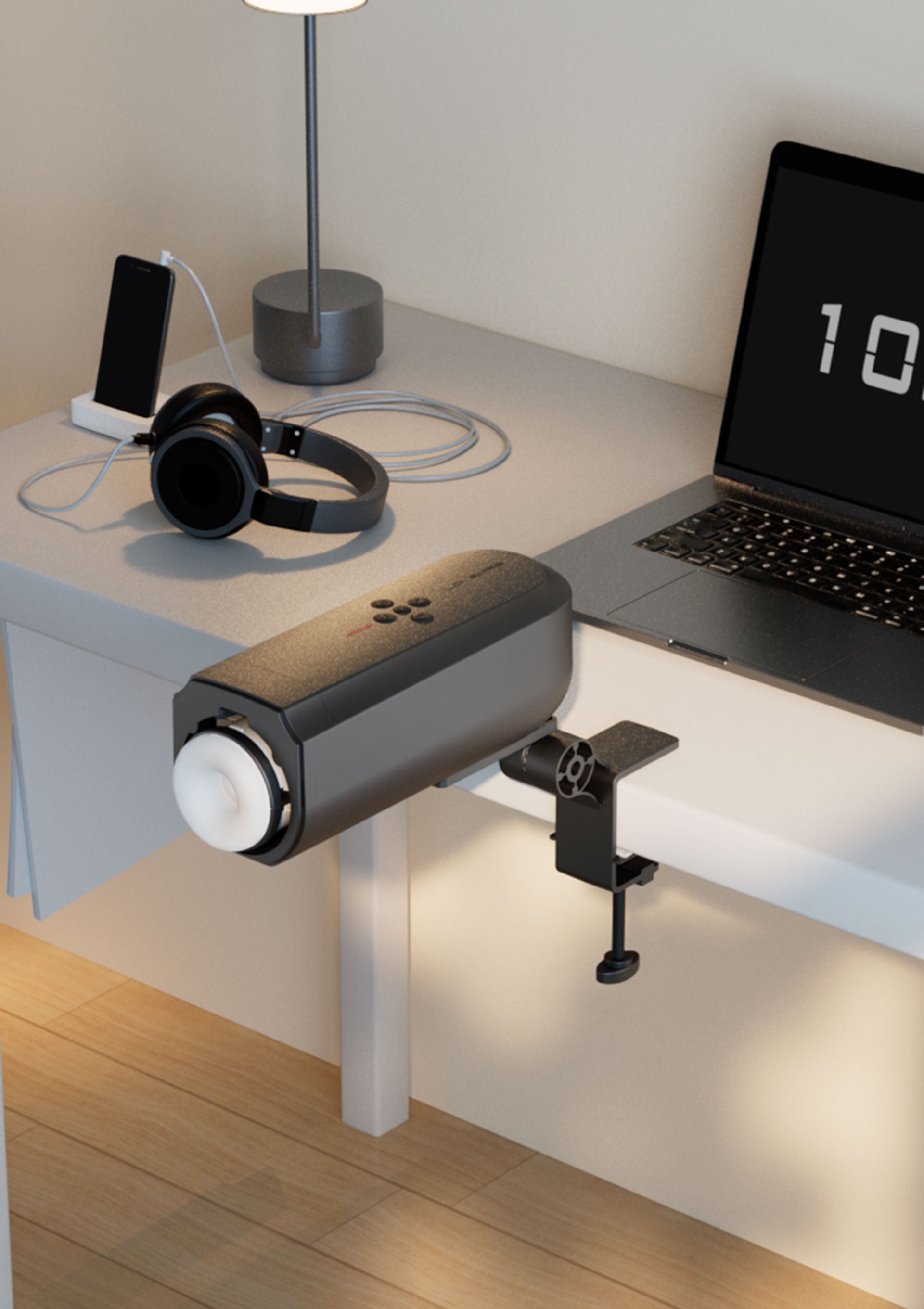 Bureau moderne avec lampe, casque, haut-parleur et ordinateur portable. Idéal pour le travail à domicile.; Moderne bureau-opstelling met lamp, hoofdtelefoon, luidspreker en laptop. Ideaal voor thuiswerken.; Modern desk setup with lamp, headphones, speaker, and laptop. Ideal for working from home.