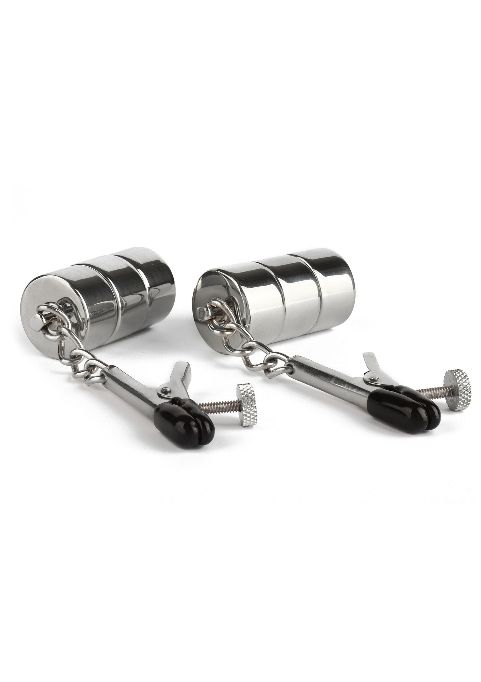 Pinces à tétons magnétiques en métal argenté. Accessoires érotiques pour adultes.; Zilverkleurige metalen magnetische tepelklemmen. Erotische accessoires voor volwassenen.; Silver-tone metal magnetic nipple clamps. Adult erotic accessories.