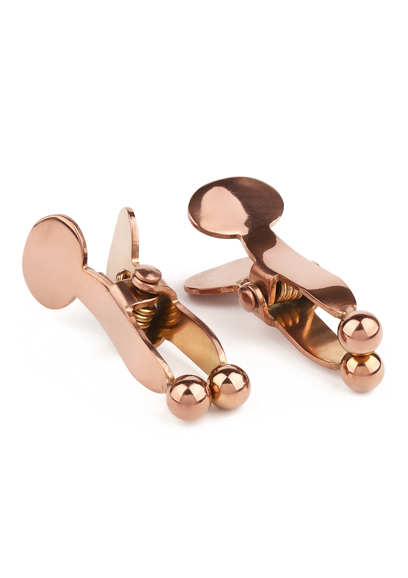 Pinces à linge décoratives en cuivre rose. Accessoires élégants pour la maison et le bureau.; Decoratieve wasknijpers in roze koper. Stijlvolle accessoires voor huis en kantoor.; Decorative rose copper clothespins. Stylish accessories for home & office.