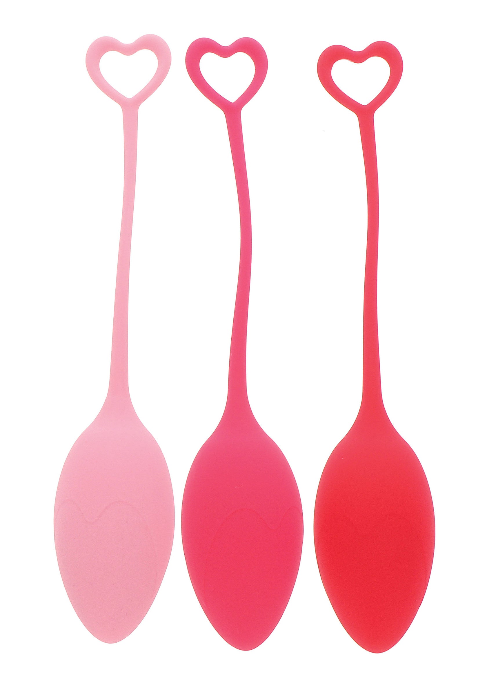 Oeufs de geisha roses en silicone avec une boucle en forme de cœur. Accessoires intimes pour l'entraînement du plancher pelvien.; Roze siliconen geishaballen met hartvormige lus. Intieme accessoires voor bekkenbodemspiertraining.; Pink silicone geisha balls with heart-shaped loop. Intimate accessories for pelvic floor muscle training.