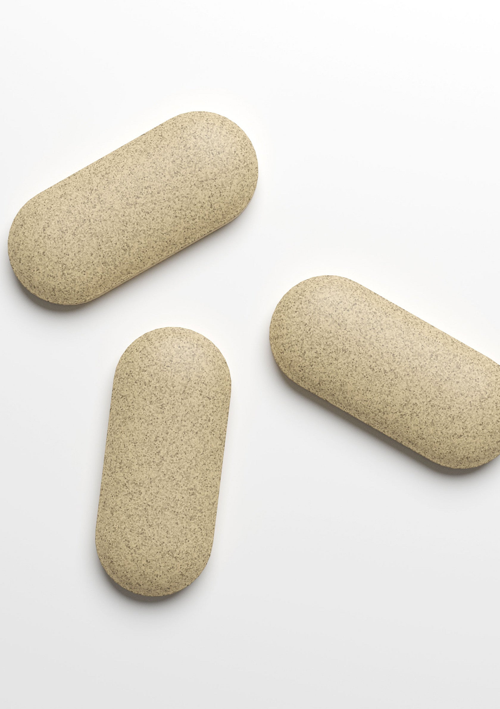 Gélules de compléments alimentaires beiges. Pilules pour la santé et le bien-être. Vitamines et suppléments nutritionnels.; Beige voedingssupplement capsules. Pillen voor gezondheid en welzijn. Vitaminen en voedingssupplementen.; Beige dietary supplement capsules. Pills for health and wellbeing. Vitamins and nutritional supplements.