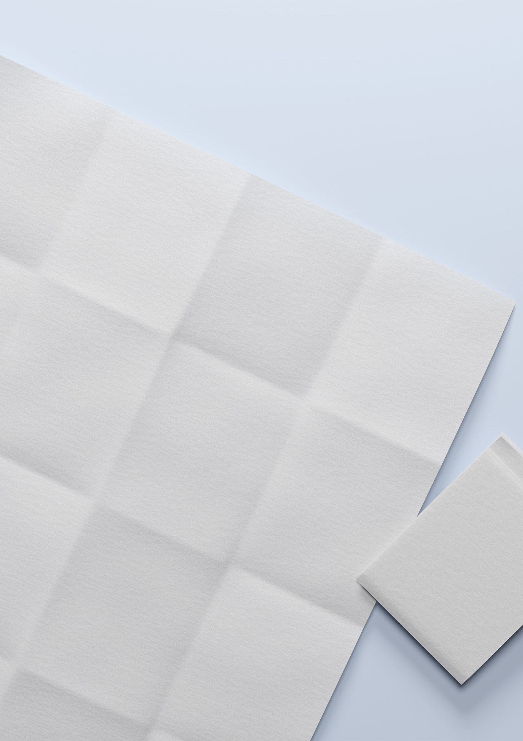 Feuille de papier blanche pliée en carrés, idéale pour l'artisanat et le scrapbooking.; Wit papier gevouwen in vierkanten, ideaal voor ambachten en scrapbooking.; White paper sheet folded into squares, ideal for crafts and scrapbooking.