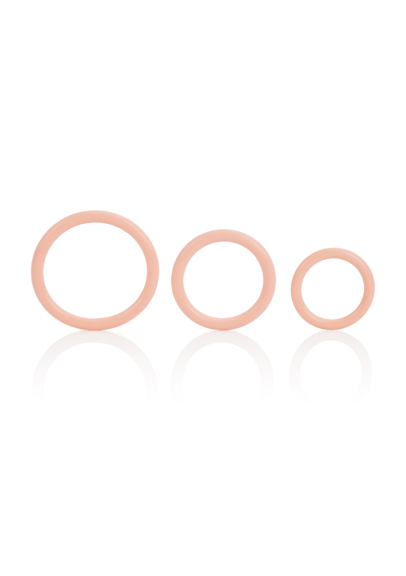 Ensemble d'anneaux roses de différentes tailles. Accessoires érotiques pour couple.; Set roze ringen in verschillende maten. Erotische accessoires voor koppels.; Set of pink rings in different sizes. Erotic accessories for couples.