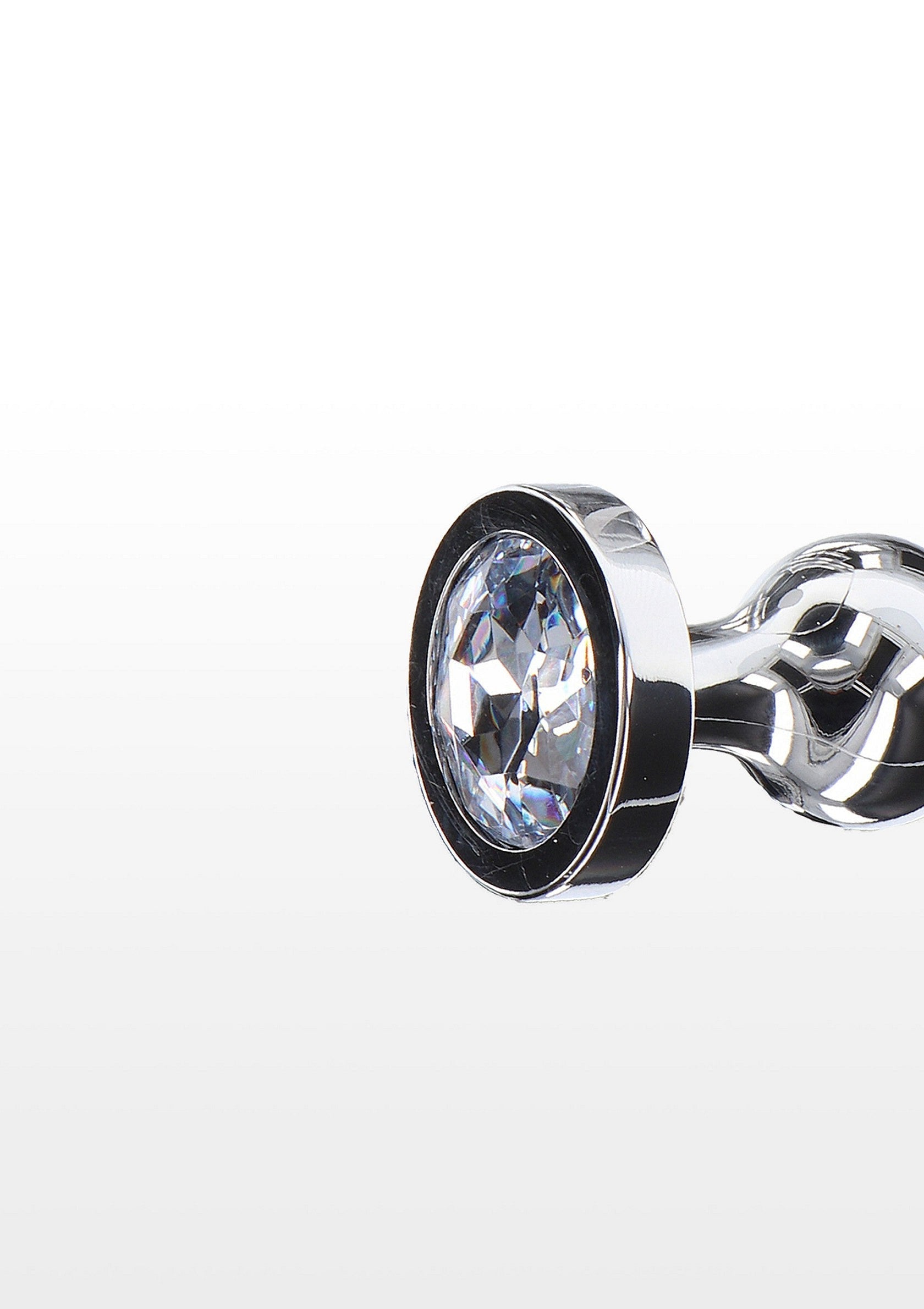 Plug anal en métal orné d'un bijou scintillant pour une touche de luxe et de plaisir intense.; Metalen buttplug versierd met een sprankelende diamant voor een vleugje luxe en intens genot.; Metal butt plug adorned with a sparkling jewel for a touch of luxury and intense pleasure.