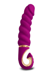 Vibromasseur torsadé violet avec poignée décorative dorée pour le plaisir intime.; Paarse, gedraaide vibrator met gouden decoratieve handgreep voor intiem plezier.; Purple, twisted vibrator with gold decorative handle for intimate pleasure.