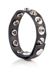 Bracelet en cuir noir clouté, ajustable avec des boutons pression argentés pour un look audacieux et personnalisé.; Zwarte leren armband met studs, verstelbaar met zilverkleurige drukknopen voor een stoere en persoonlijke look.; Black studded leather wristband, adjustable with silver-tone snaps for a bold, personalized look.