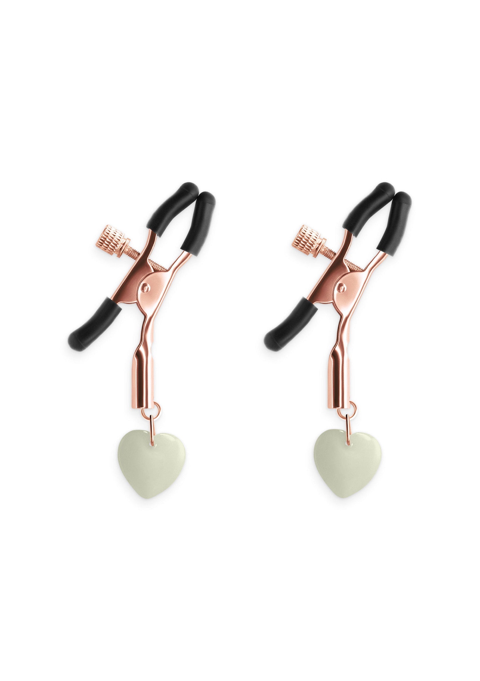 Pinces à tétons avec pendentif en forme de cœur. Accessoires coquins pour pimenter votre vie amoureuse.; Tepelklemmen met hartjes hanger. Speelse accessoires om je liefdesleven op te fleuren.; Nipple clamps with heart pendant. Playful accessories to spice up your love life.