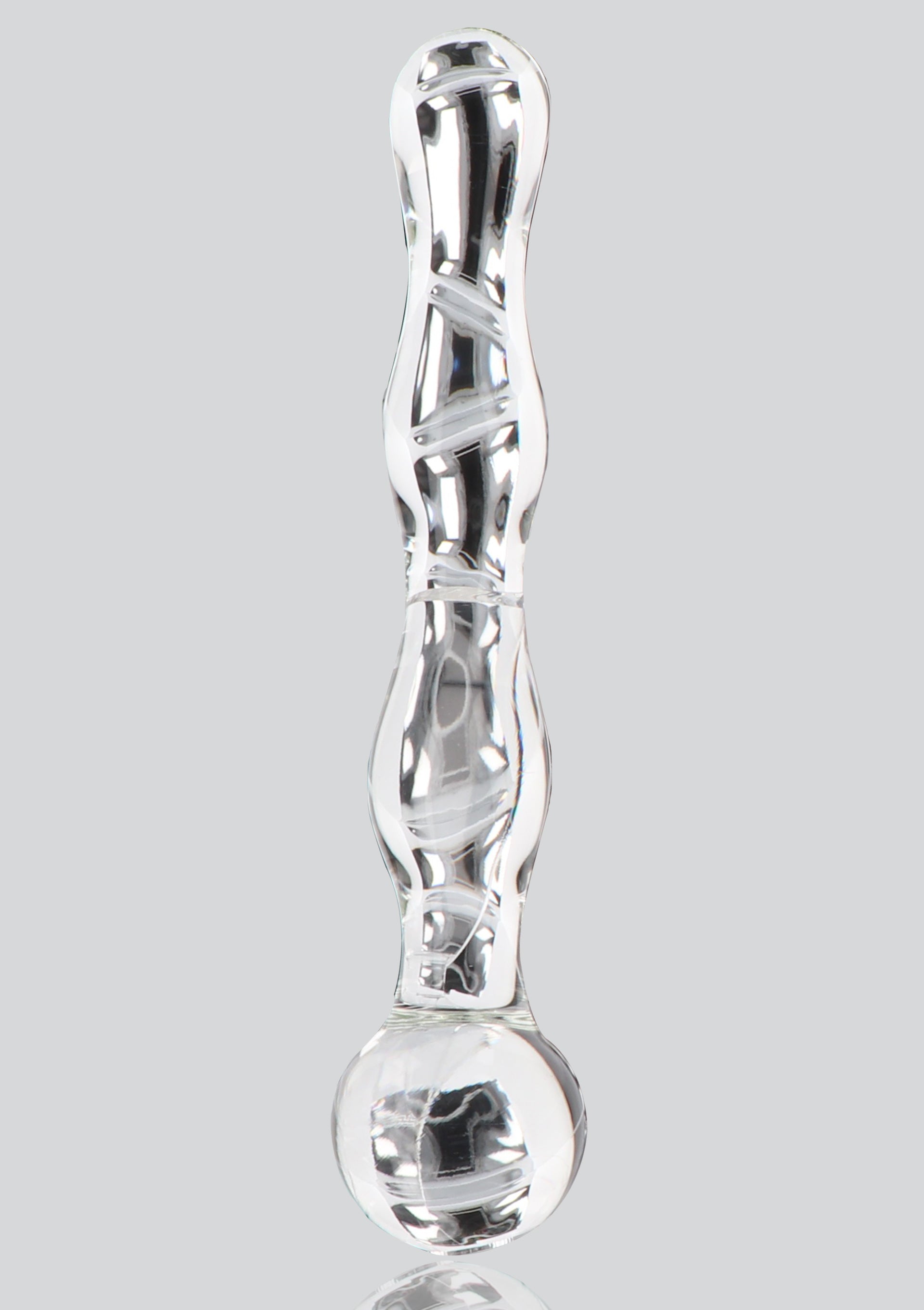 Plug anal en verre transparent avec motif en spirale, pour des sensations uniques et un plaisir intense.; Transparante glazen anale plug met spiraalpatroon, voor unieke sensaties en intens genot.; Clear glass anal plug with spiral design, for unique sensations and intense pleasure.