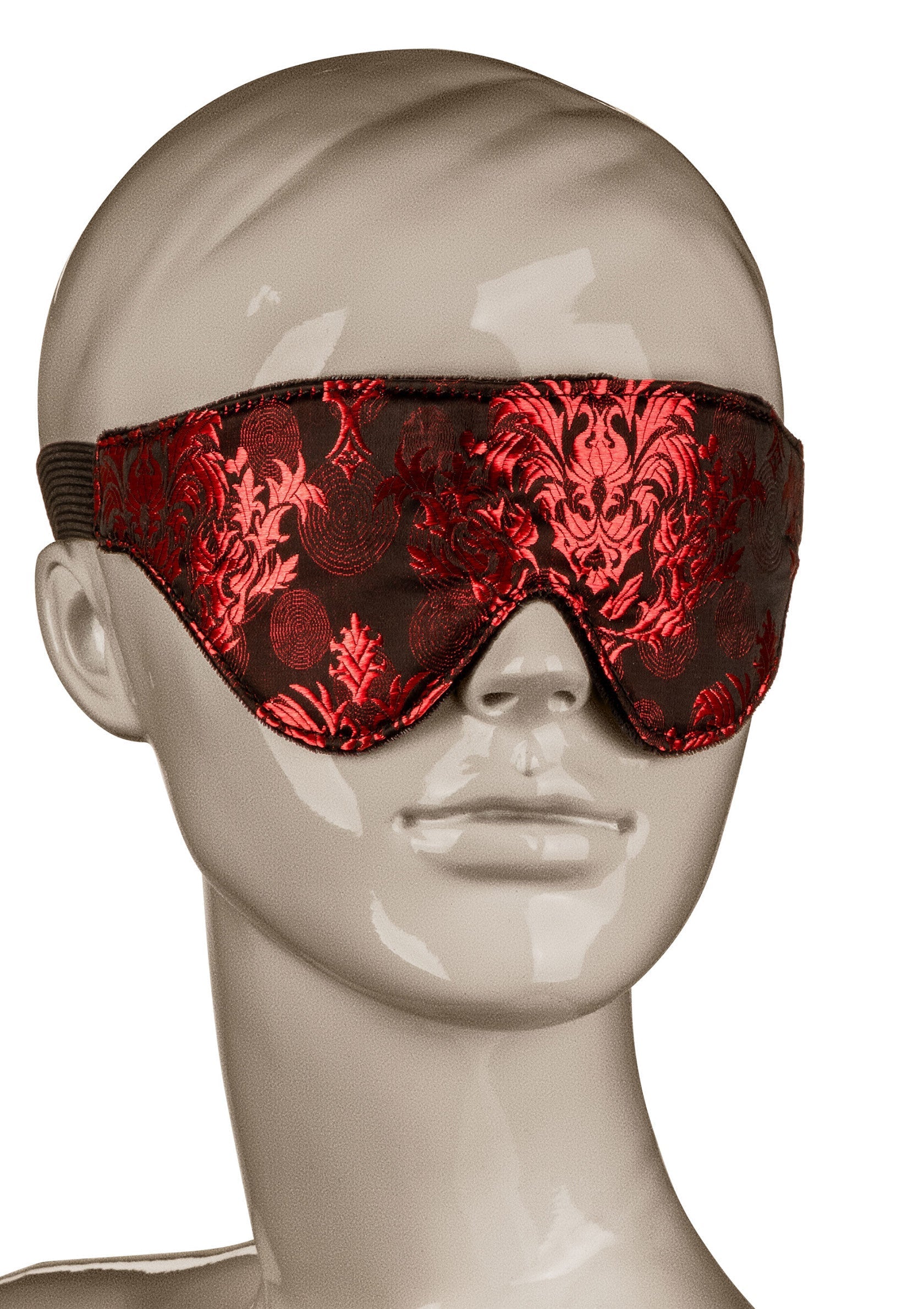 Masque de sommeil rouge et noir à motifs, parfait pour une nuit paisible ou des jeux de rôle coquins.; Rood en zwart slaapmasker met patroon, perfect voor een rustige nacht of ondeugende rollenspellen.; Red and black patterned sleep mask, perfect for a restful night or kinky roleplay.