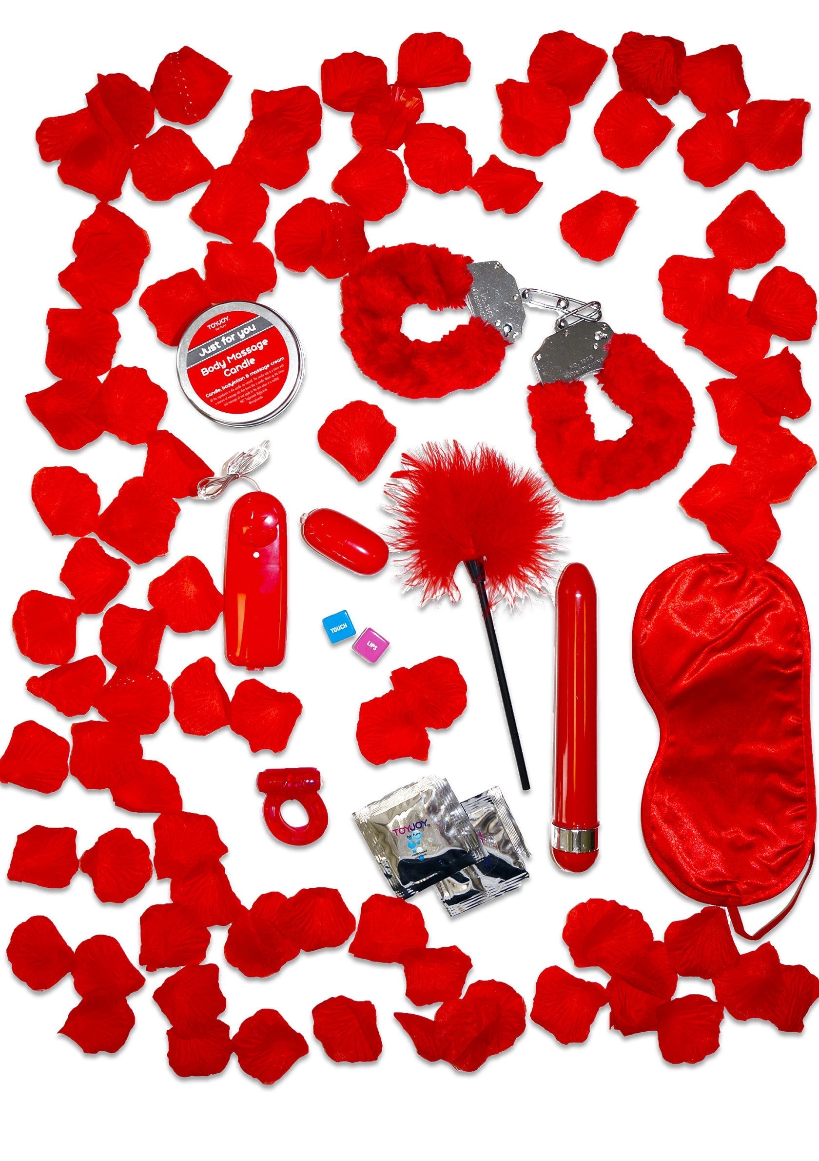 Kit coquin romantique: pétales rouges, menottes, vibromasseurs et plus pour pimenter votre vie amoureuse.; Romantische ondeugende set: rode bloemblaadjes, handboeien, vibrators en meer om uw liefdesleven op te fleuren.; Romantic naughty set: red petals, handcuffs, vibrators & more to spice up your love life.