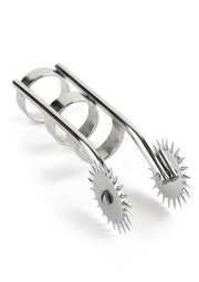 Roue de Wartenberg double en acier inoxydable. Stimulez votre corps avec cet accessoire sensoriel.; Dubbele Wartenberg-wiel van roestvrij staal. Stimuleer je lichaam met dit sensoriële accessoire.; Stainless steel double Wartenberg wheel. Stimulate your body with this sensory accessory.