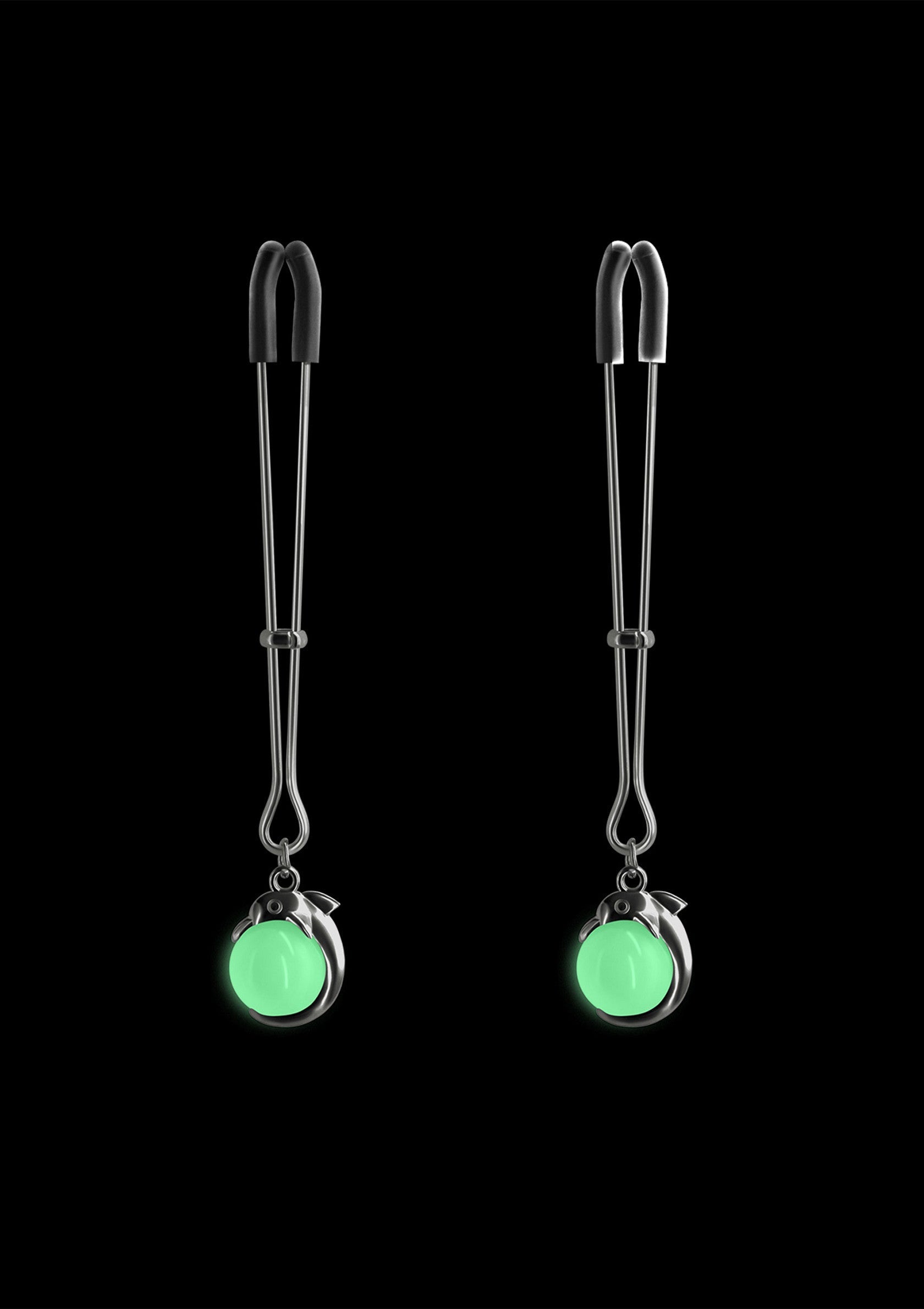 Pinces à tétons avec boules phosphorescentes, pour un plaisir lumineux et sensuel. Osez l'originalité !; Tepelklemmen met glow-in-the-dark ballen voor een sensueel plezier. Durf origineel te zijn!; Nipple clamps with glow-in-the-dark balls for luminous, sensual fun. Dare to be original!