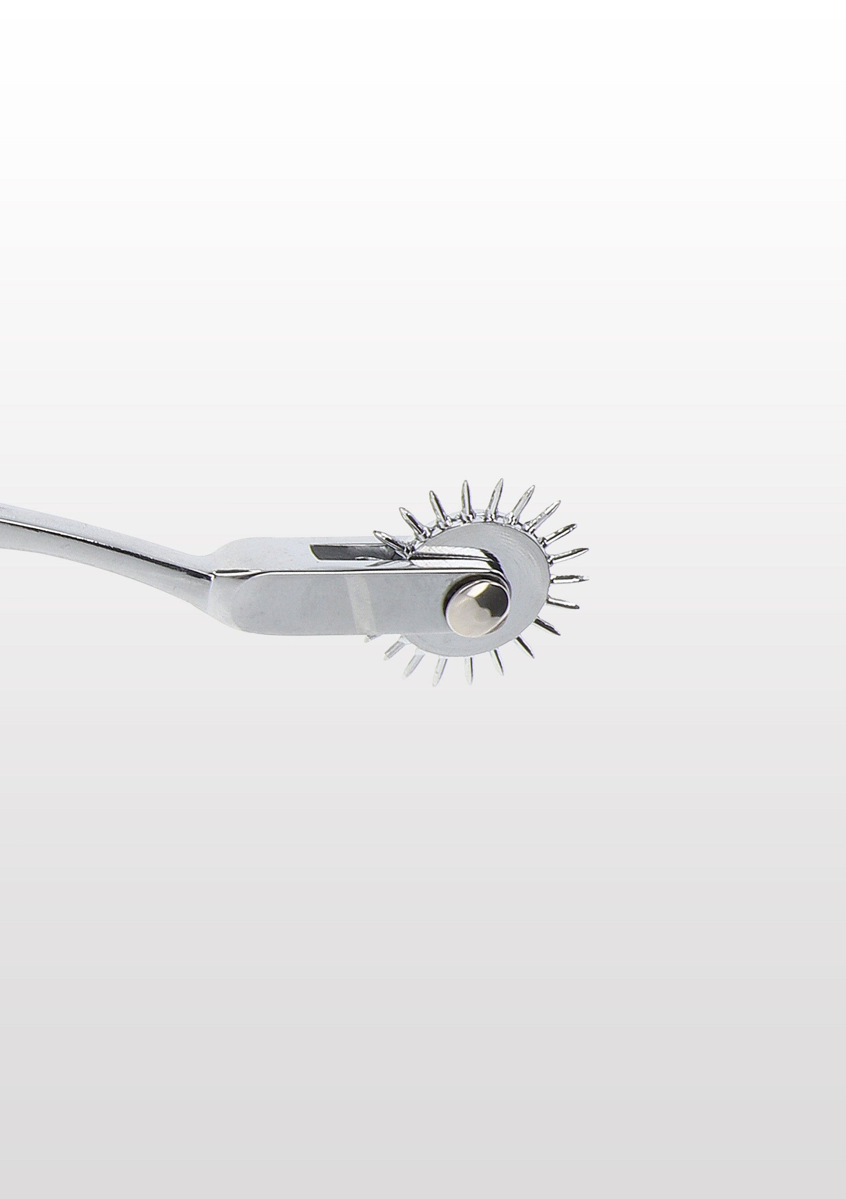 Roulette de Wartenberg en métal chromé pour l'exploration neurologique et la stimulation sensorielle.; Wartenberg-wieltje van verchroomd metaal voor neurologisch onderzoek en sensorische stimulatie.; Chrome metal Wartenberg wheel for neurological exams and sensory stimulation.
