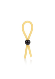 Anneau pénien en silicone beige avec bille noire pour un plaisir intense. Découvrez le confort et le contrôle avec cet accessoire érotique.; Beige siliconen penisring met zwarte kraal voor intens genot. Ontdek comfort en controle met dit erotische accessoire.; Beige silicone cock ring with black bead for intense pleasure. Discover comfort and control with this erotic accessory.