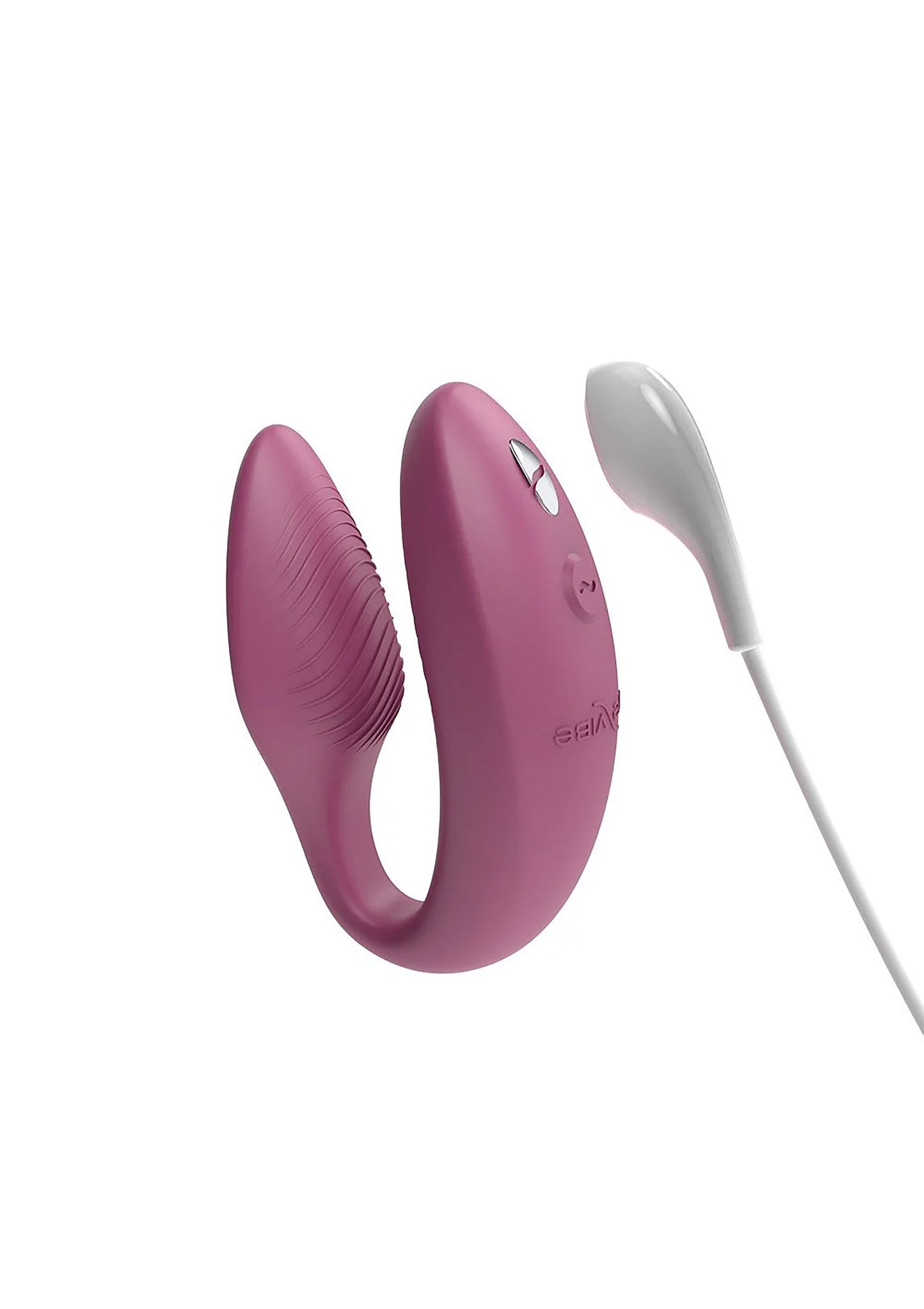 Vibrateur rose double avec applicateur pour plaisir féminin.; Dubbele roze vibrator met applicator voor vrouwelijk genot.; Double pink vibrator with applicator for female pleasure.