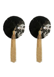 Cache-tétons noirs à paillettes avec chaînes dorées.; Zwarte tepelbedekkers met pailletten en gouden kettingen.; Black sequin nipple covers with gold chains.