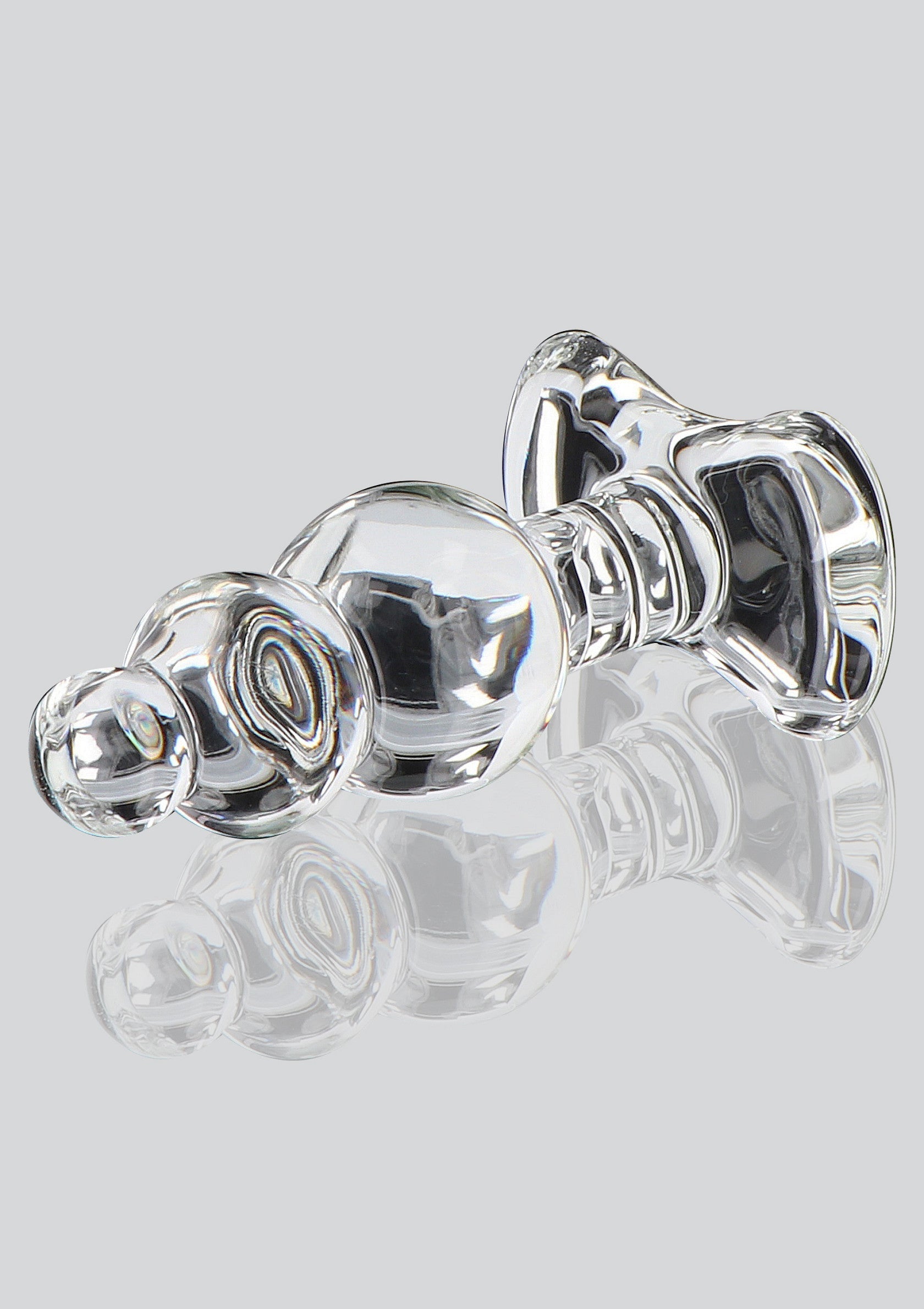 Plug anal en verre transparent pour une expérience unique et luxueuse.; Transparante glazen anaalplug voor een unieke en luxueuze ervaring.; Clear glass anal plug for a unique & luxurious experience.