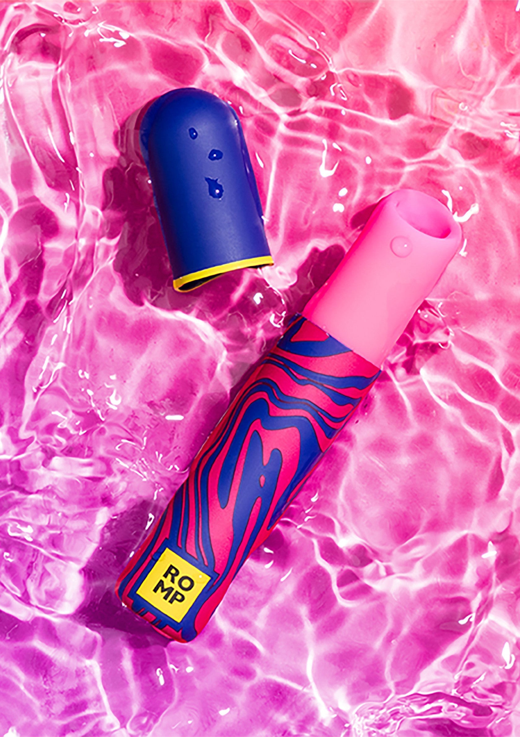 Vibromasseur Romp Wave pour le plaisir aquatique. Design fun et couleurs vives pour une expérience unique.; Romp Wave vibrator voor aquatisch plezier. Fun design en levendige kleuren voor een unieke ervaring.; Romp Wave vibrator for aquatic fun. Fun design and bright colors for a unique experience.