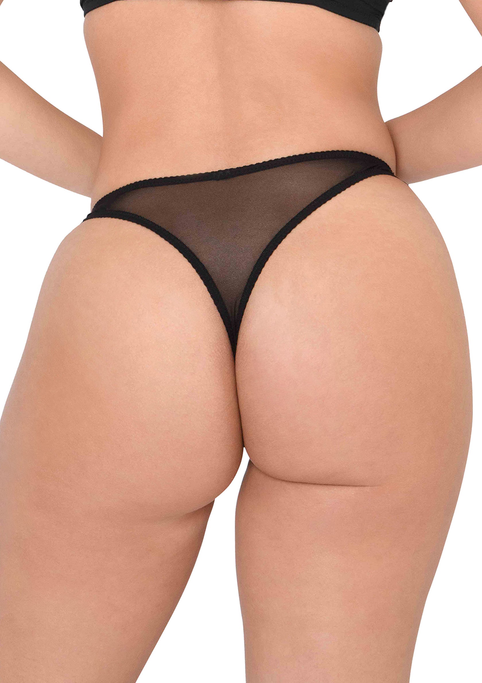 String tanga noir transparent pour femme. Lingerie fine et séduisante. ; Zwarte, doorschijnende string voor dames. Verleidelijke en fijne lingerie.; Sheer black thong for women. Seductive and delicate lingerie.