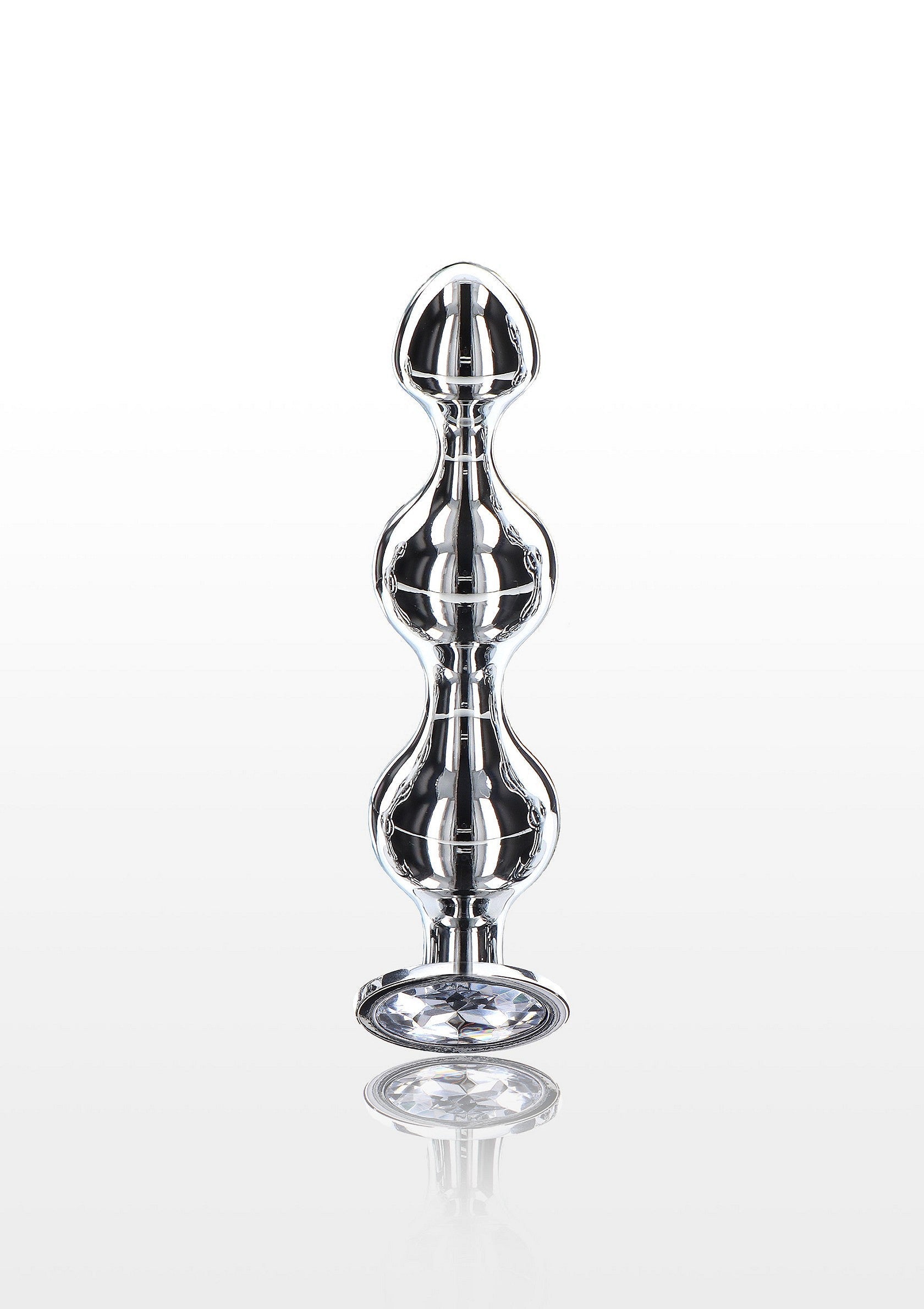 Plug anal en métal argenté, lisse et ergonomique, pour une expérience sensuelle et confortable.; Gladde, ergonomische, zilverkleurige metalen anale plug voor een sensuele en comfortabele ervaring.; Smooth, ergonomic, silver-colored metal anal plug for a sensual and comfortable experience.