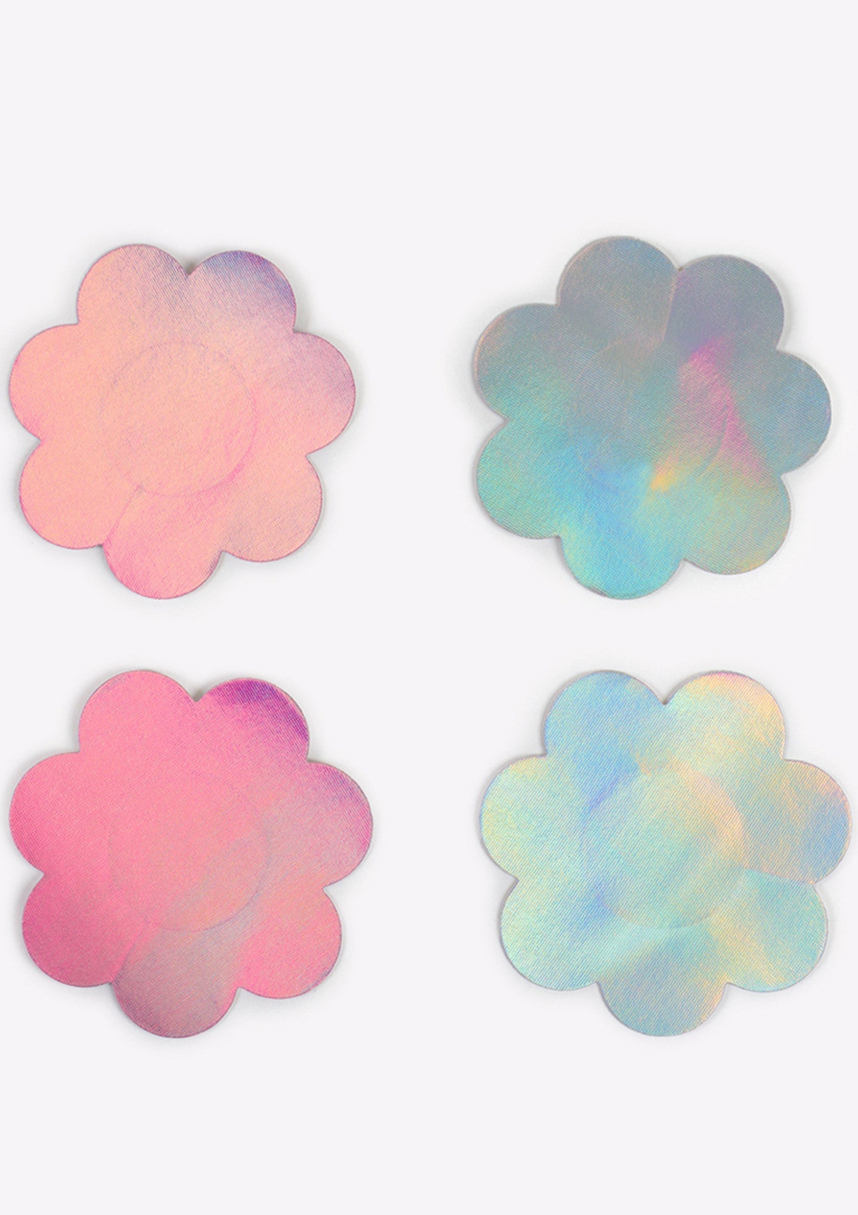 Cache-tétons en forme de fleur holographique pour un look tendance et discret.; Holografische tepelbedekkers in bloemvorm voor een trendy en discrete look.; Holographic flower pasties for a trendy, discreet look. Nipple covers.