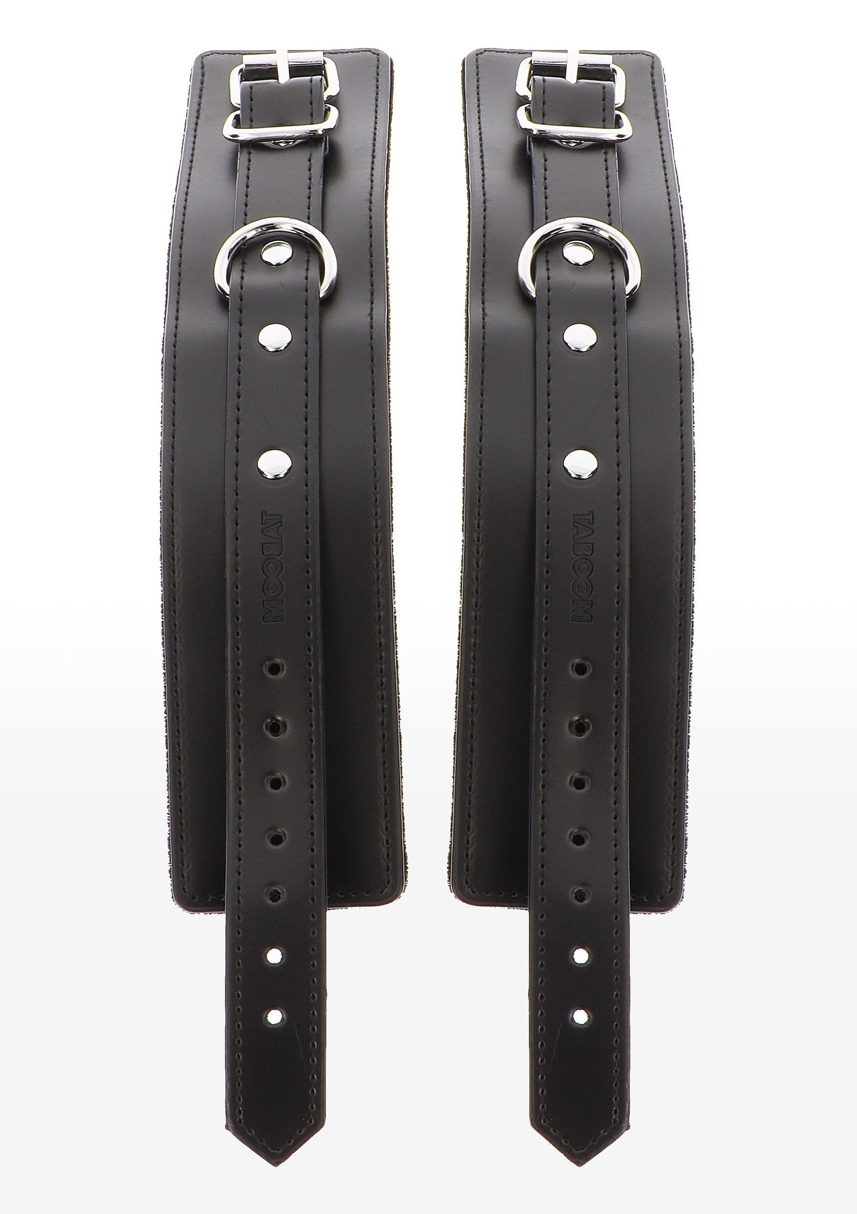 Manchettes en cuir noir réglables avec boucles métalliques pour une fixation sécurisée.; Verstelbare zwarte leren manchetten met metalen gespen voor een veilige bevestiging.; Adjustable black leather wrist restraints with metal buckles for secure attachment.