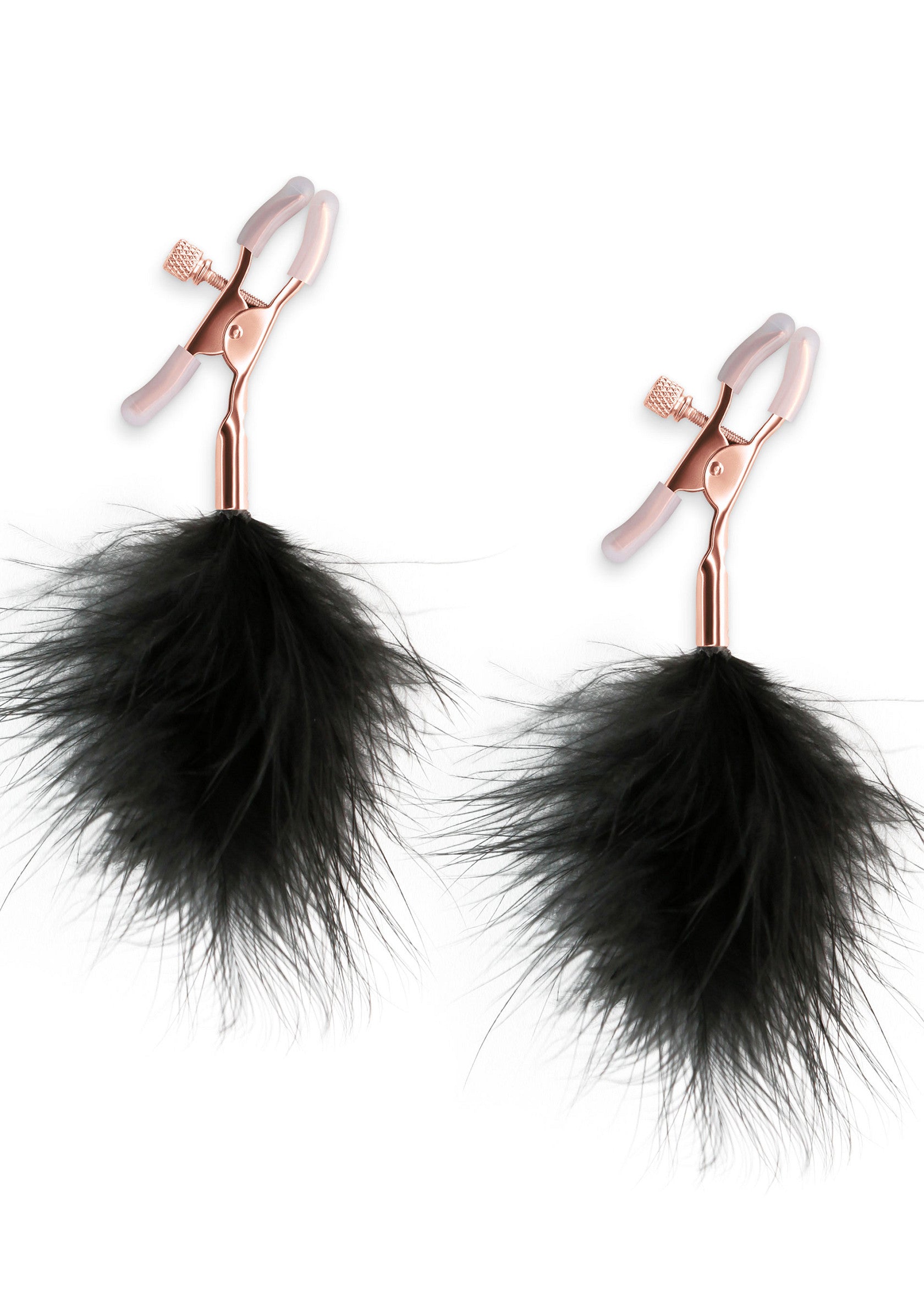 Pinces à tétons à plumes noires. Accessoires coquins pour pimenter votre vie amoureuse et explorer le plaisir.; Zwarte veren tepelklemmen. Speelse accessoires om je liefdesleven op te fleuren en plezier te ontdekken.; Black feather nipple clamps. Playful accessories to spice up your love life and explore pleasure.