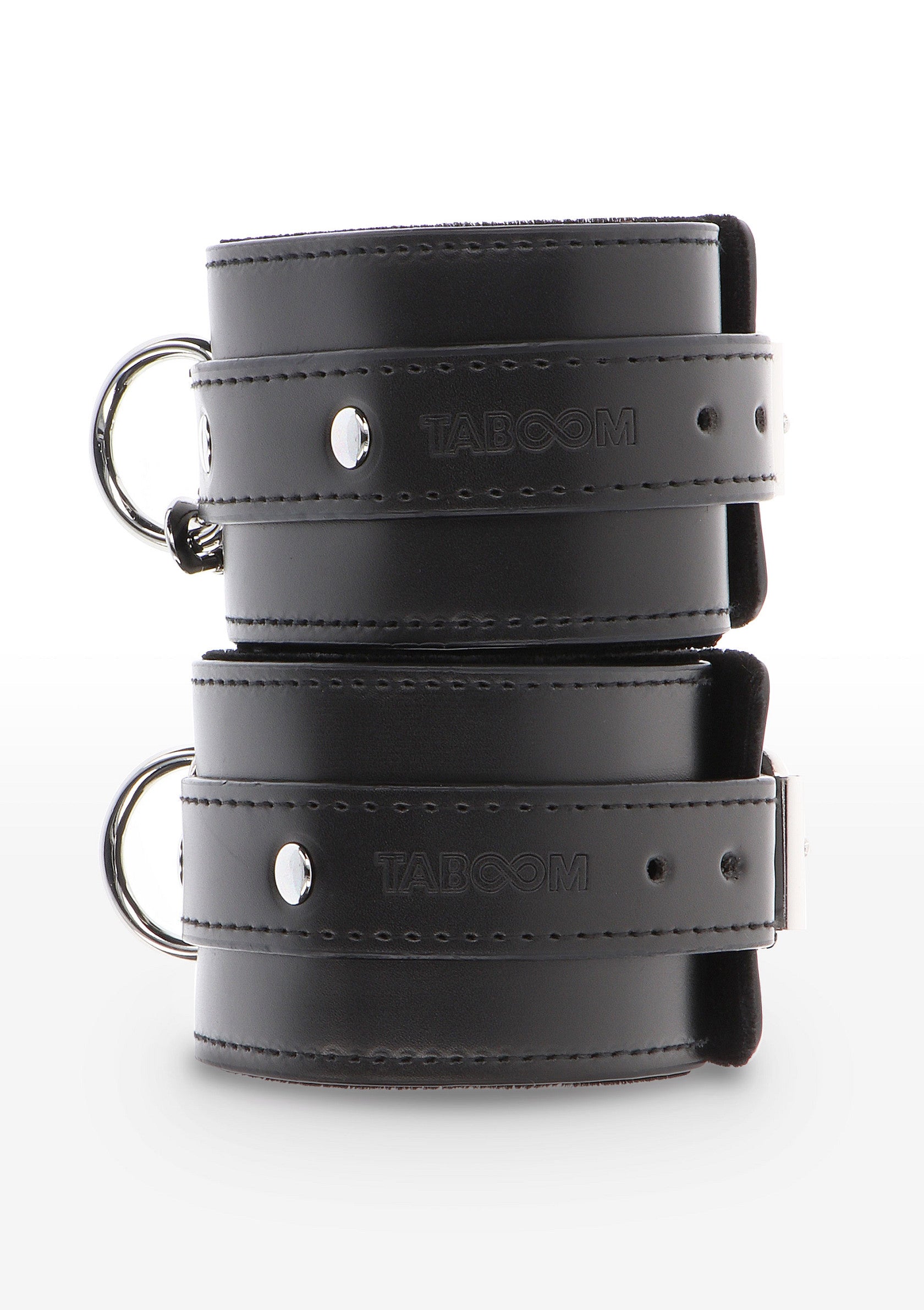 Menottes en cuir noir TABOOM pour une expérience sensuelle et sécurisée. Explorez vos fantasmes en toute sécurité.; TABOOM lederen handboeien in zwart voor een sensuele en veilige ervaring. Verken je fantasieën in alle veiligheid.; TABOOM leather restraints in black for a sensual, secure experience. Explore your fantasies safely and stylishly.