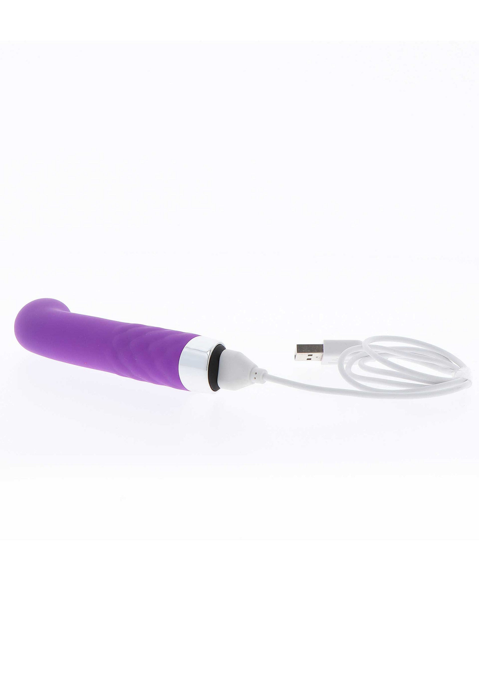 Vibrateur violet rechargeable par USB pour le plaisir intime.; Paarse vibrator, oplaadbaar via USB, voor intiem plezier.; Purple vibrator, USB rechargeable, for intimate pleasure.