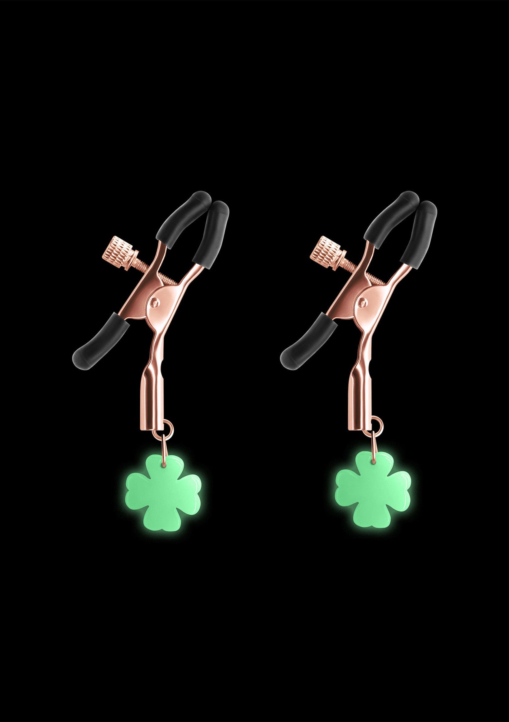 Pince-tétons trèfle à quatre feuilles luminescente pour pimenter vos soirées coquines. Amusez-vous avec ces accessoires originaux.; Tepelklemmen met klaverblad hanger om je ondeugende avonden mee op te fleuren. Plezier verzekerd met deze originele accessoires.; Four-leaf clover nipple clamps to spice up your naughty nights. Have fun with these original accessories.