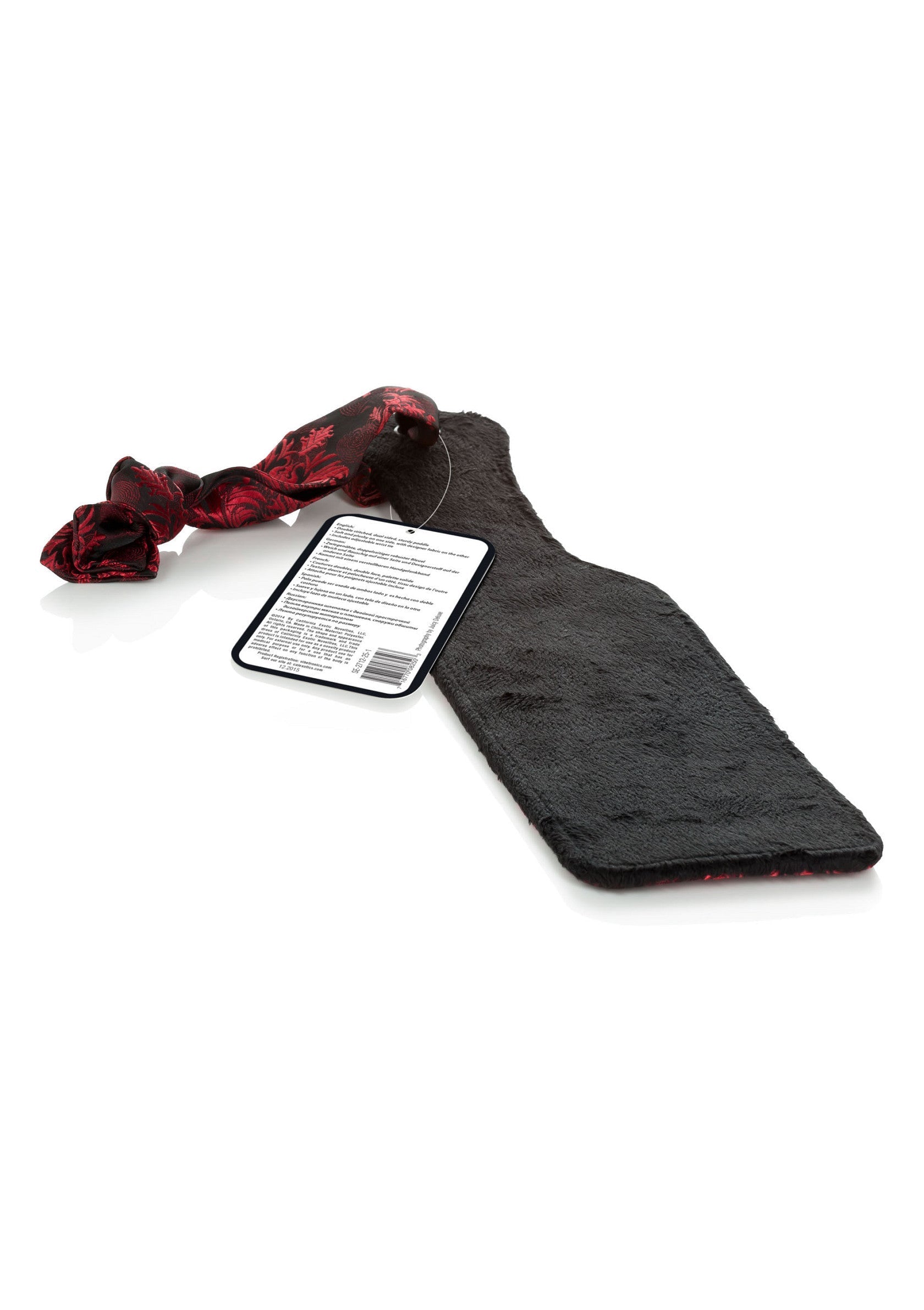 Palette de fessée noire texturée avec ruban rouge, parfaite pour ajouter du piquant à vos jeux coquins. Découvrez notre sélection de produits érotiques.; Getextureerde zwarte spankler met rode lint, perfect om pit toe te voegen aan je stoutste spelletjes. Bekijk onze selectie erotische producten.; Textured black spanker with red ribbon, perfect for adding spice to your naughty games. Check out our selection of erotic products.