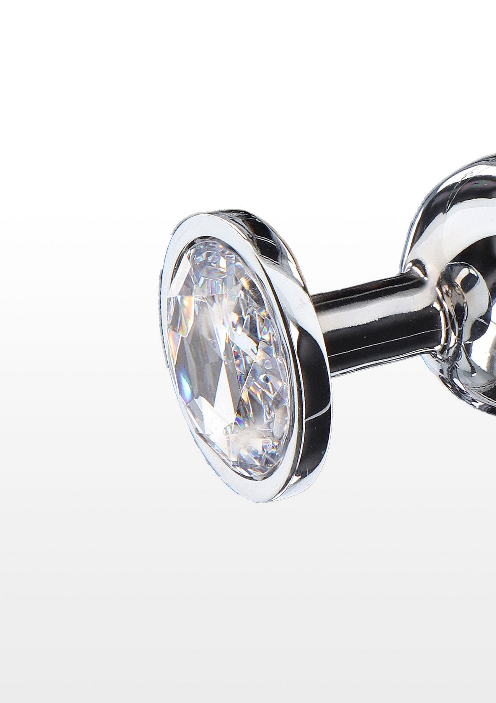 Bijou anal élégant avec un cristal étincelant pour une touche de luxe.; Elegante anale plug met een glinsterende kristal voor een luxe tintje.; Elegant anal plug with a sparkling crystal for a touch of luxury.