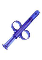 Applicateur en plastique violet pour cosmétiques ou médicaments.; Paarse plastic applicator voor cosmetica of medicijnen.; Purple plastic applicator for cosmetics or medication.