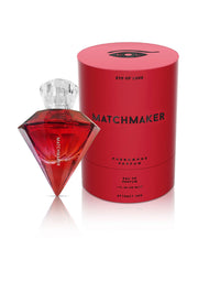 Eye of Love Matchmaker, parfum phéromones pour elle. Flacon rouge élégant, senteur irrésistible. ; Eye of Love Matchmaker feromoon parfum voor haar. Elegante rode fles, onweerstaanbare geur. ; Eye of Love Matchmaker pheromone perfume for her. Elegant red bottle, irresistible scent. 
