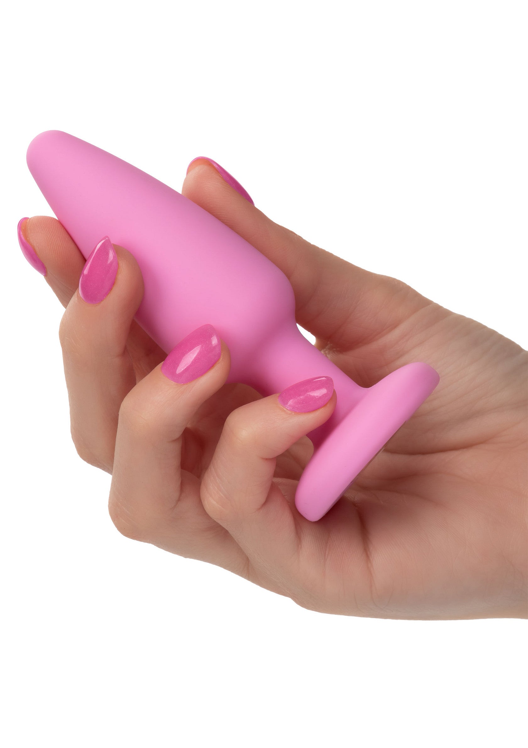 Plug anal rose en silicone doux tenu par une main. Plaisir et sensualité garantis. Découvrez notre collection dès maintenant !; Roze butt plug van zachte siliconen in een hand. Gegarandeerd plezier en sensualiteit. Bekijk nu onze collectie!; Pink butt plug made of soft silicone held in a hand. Guaranteed pleasure and sensuality. Discover our collection now!