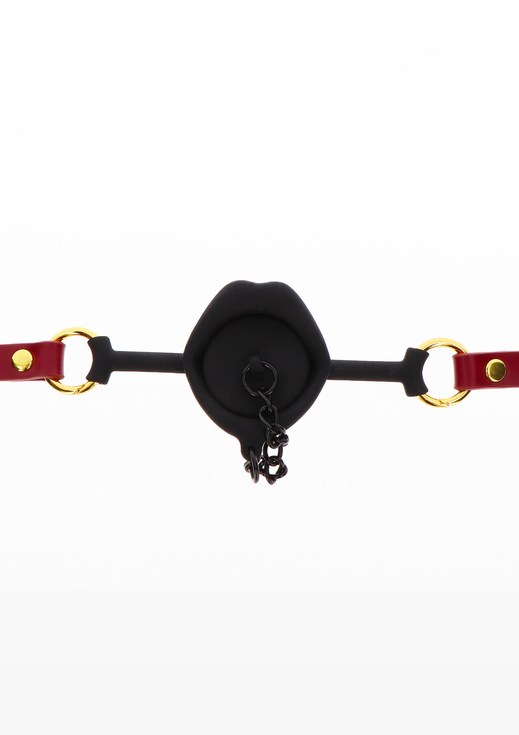 Bâillon buccal rouge avec des lèvres noires et une chaîne, pour des jeux coquins.; Rode mondknevel met zwarte lippen en ketting, voor ondeugende spelletjes.; Red mouth gag with black lips and chain, for naughty games.