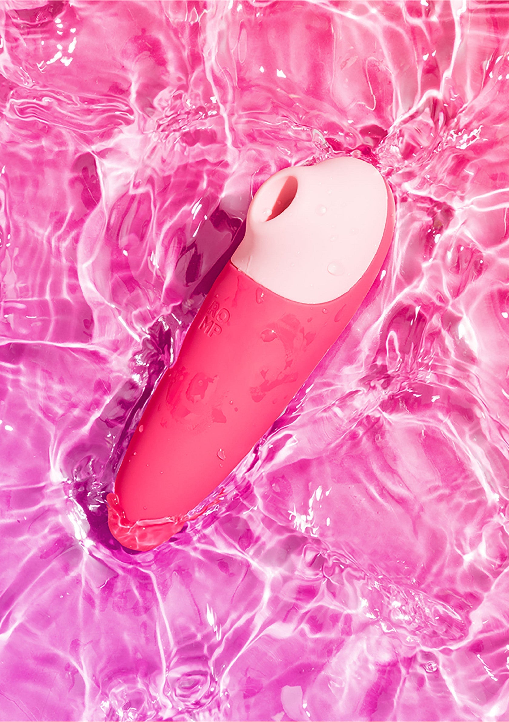 Manchon de plaisir rose et blanc dans l'eau, pour des sensations intenses et aquatiques.; Roze en witte masturbator in water, voor intense en aquatische sensaties.; Pink and white pleasure sleeve in water, for intense and aquatic sensations.