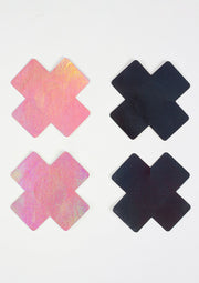 Cache-tétons en forme de croix roses et noirs.; Kruisvormige tepelbedekkers in roze en zwart.; Cross-shaped nipple covers in pink and black.