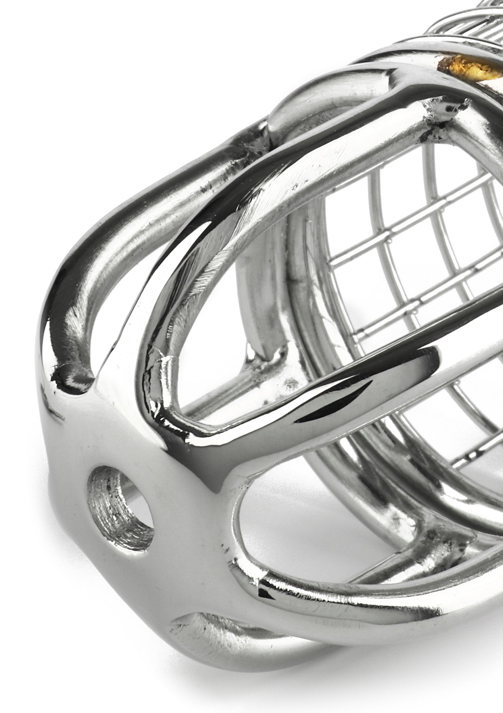 Cage de chasteté masculine en métal brillant. Dispositif de contrôle et de soumission.; Glanzende metalen kuisheidskooi voor mannen. Beheersings- en onderwerpingstoestel.; Shiny metal male chastity cage. Control and submission device.