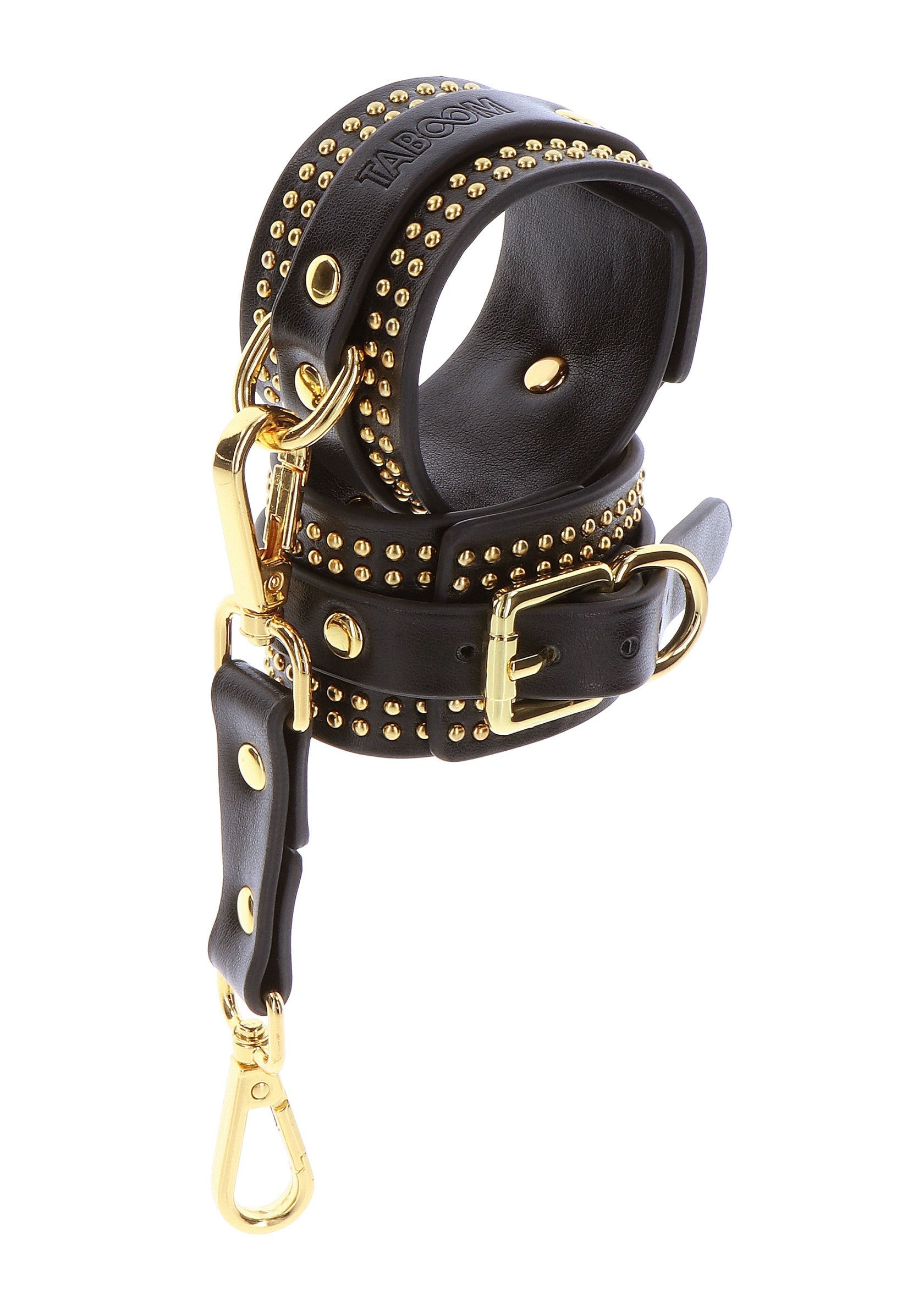 Manchette en cuir noir clouté d'or avec fermoir mousqueton doré.; Zwarte leren armband met gouden studs en gouden karabijnsluiting.; Black leather wrist cuff with gold studs and gold lobster clasp.