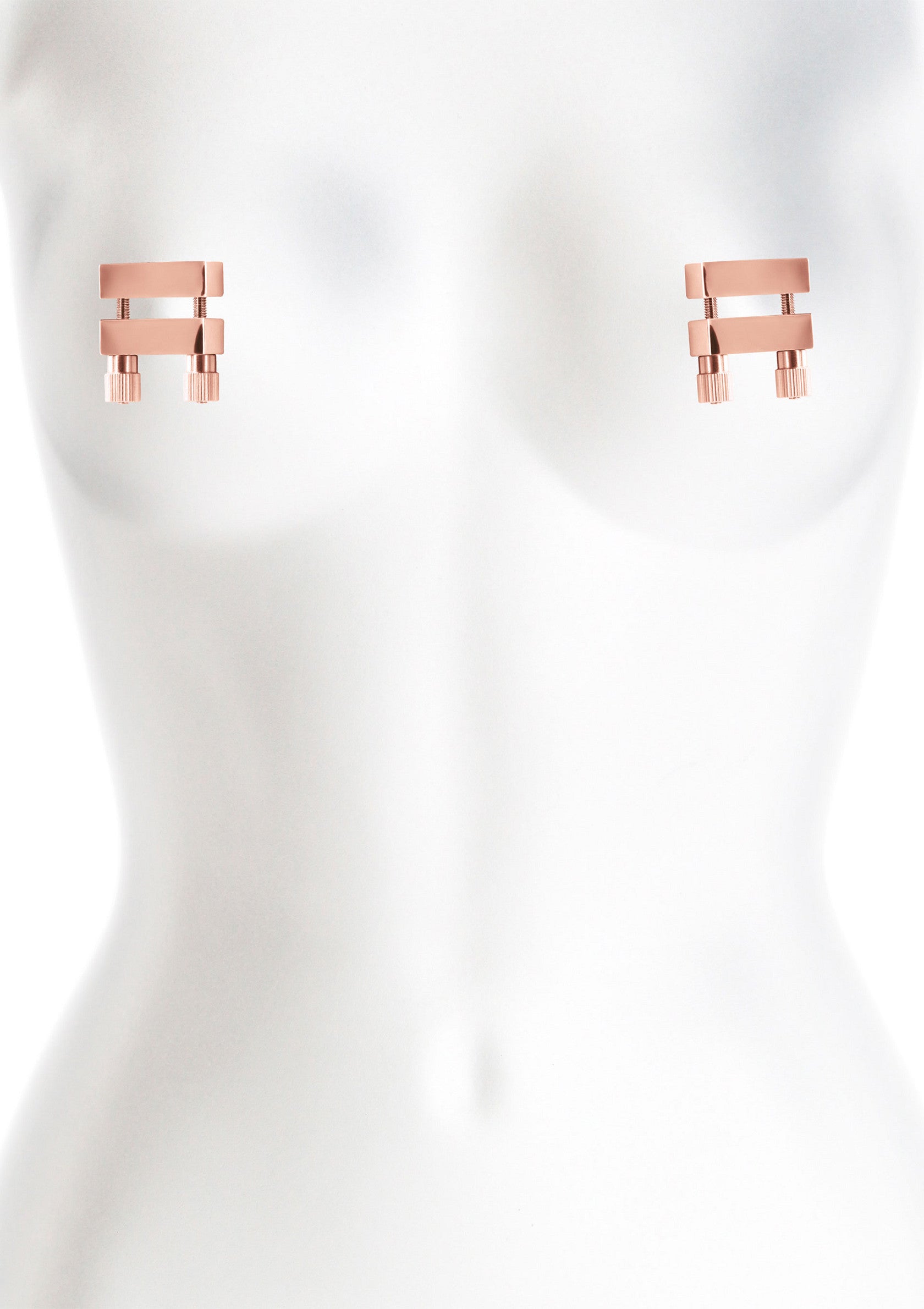 Cache-tétons adhésifs en métal rose, pour un look audacieux et discret.; Roze metalen tepelbedekkers, voor een gedurfde en discrete look.; Rose gold metal pasties, for a bold and discreet look.