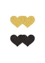 Cache-tétons en forme de cœur, pailletés or et noir.; Hartvormige tepelbedekkers met glitter in goud en zwart.; Heart-shaped nipple covers with glitter in gold and black.