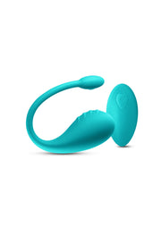 Vibromasseur vibrant turquoise avec télécommande pour le plaisir féminin.; Turkoois vibrerende vibrator met afstandsbediening voor vrouwelijk genot.; Teal vibrating vibrator with remote for female pleasure.