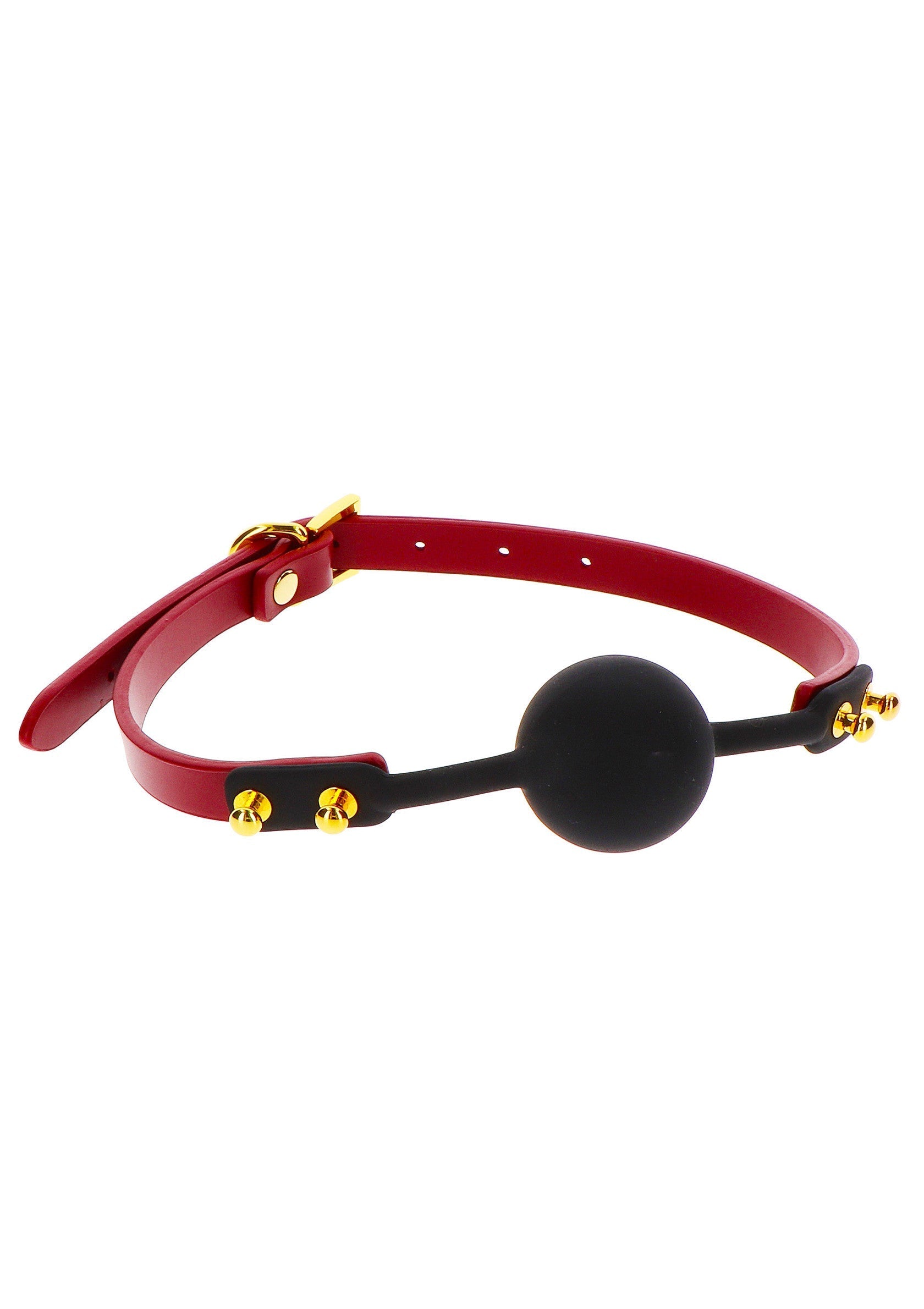Bâillon à boule rouge et noire pour les jeux coquins.; Rode en zwarte balgag voor ondeugende spelletjes.; Red and black ball gag for kinky games.