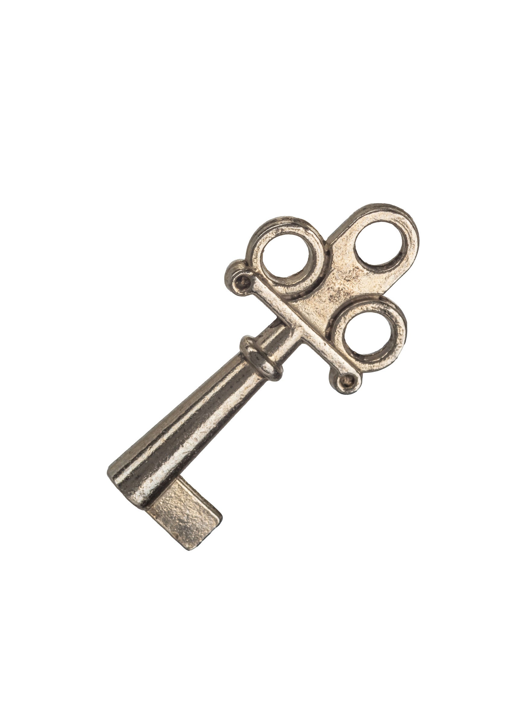 Clé ancienne décorative avec motif de trois cercles. Parfait pour une touche vintage et élégante.; Decoratieve antieke sleutel met drie cirkels. Perfect voor een vintage en elegante touch.; Decorative antique key with three-circle design. Perfect for a vintage and elegant touch.