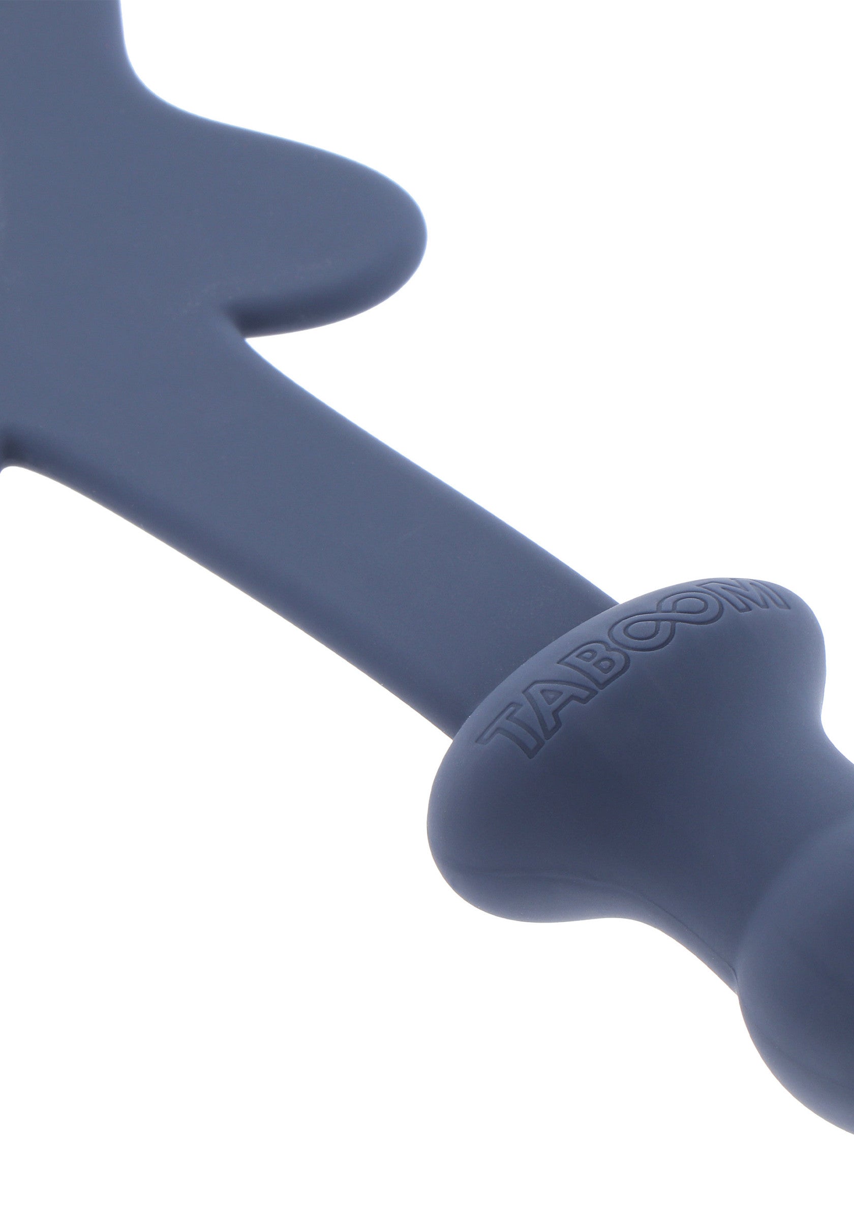 Jouet pour bébé Taboo en silicone bleu, forme originale et matériau sûr pour la dentition.; Blauw siliconen Taboo babyspeelgoed, originele vorm en veilig materiaal voor doorkomende tandjes.; Blue silicone Taboo baby toy, original shape and safe material for teething.
