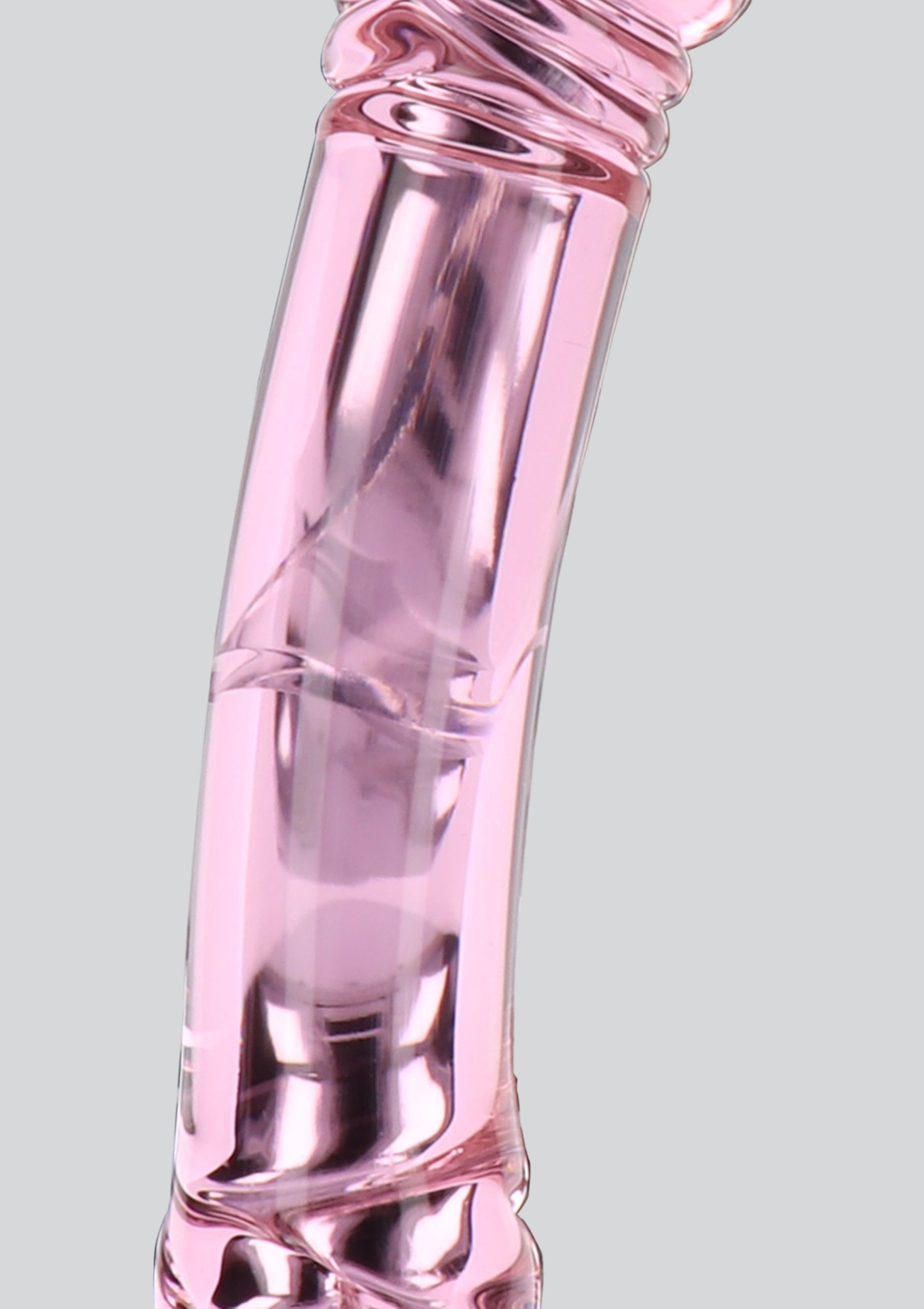 Flacon rose de parfum. Parfum pour femme élégant et moderne.; Roze parfumfles. Elegante en moderne damesgeur.; Pink perfume bottle. Elegant and modern women's fragrance.