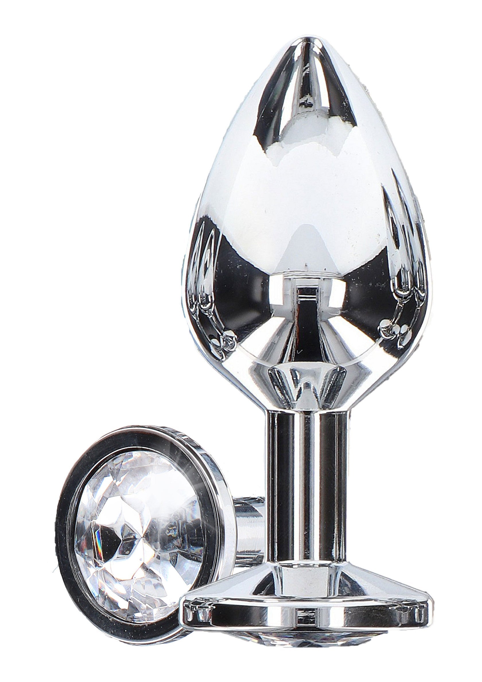 Plug anal argenté brillant avec bijou étincelant pour le plaisir.; Glanzende zilveren anale plug met sprankelende edelsteen voor plezier.; Shiny silver anal plug with sparkly gem for pleasure.