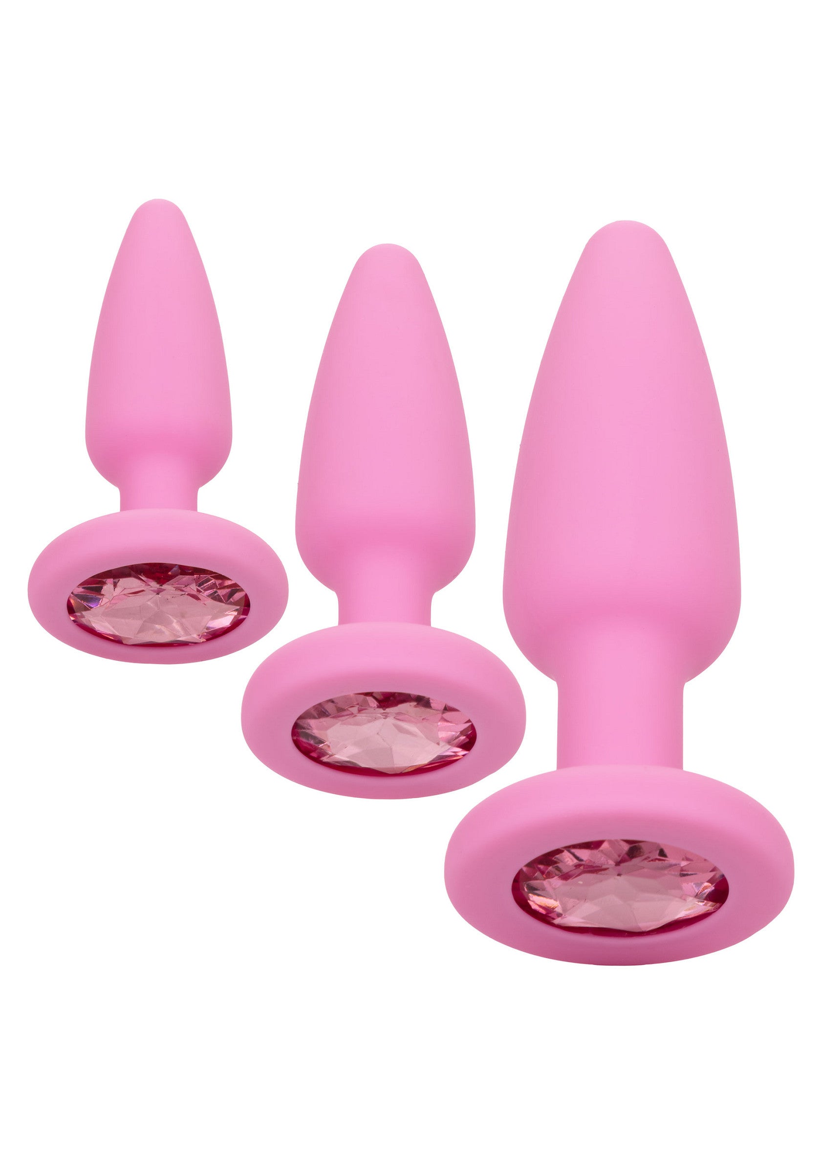 Ensemble de 3 plugs anaux roses avec pierres précieuses. Pour un plaisir délicat et scintillant.; Set van 3 roze anale plugs met edelstenen. Voor subtiel en sprankelend plezier.; Set of 3 pink butt plugs with gemstones. For a subtle and sparkling pleasure.