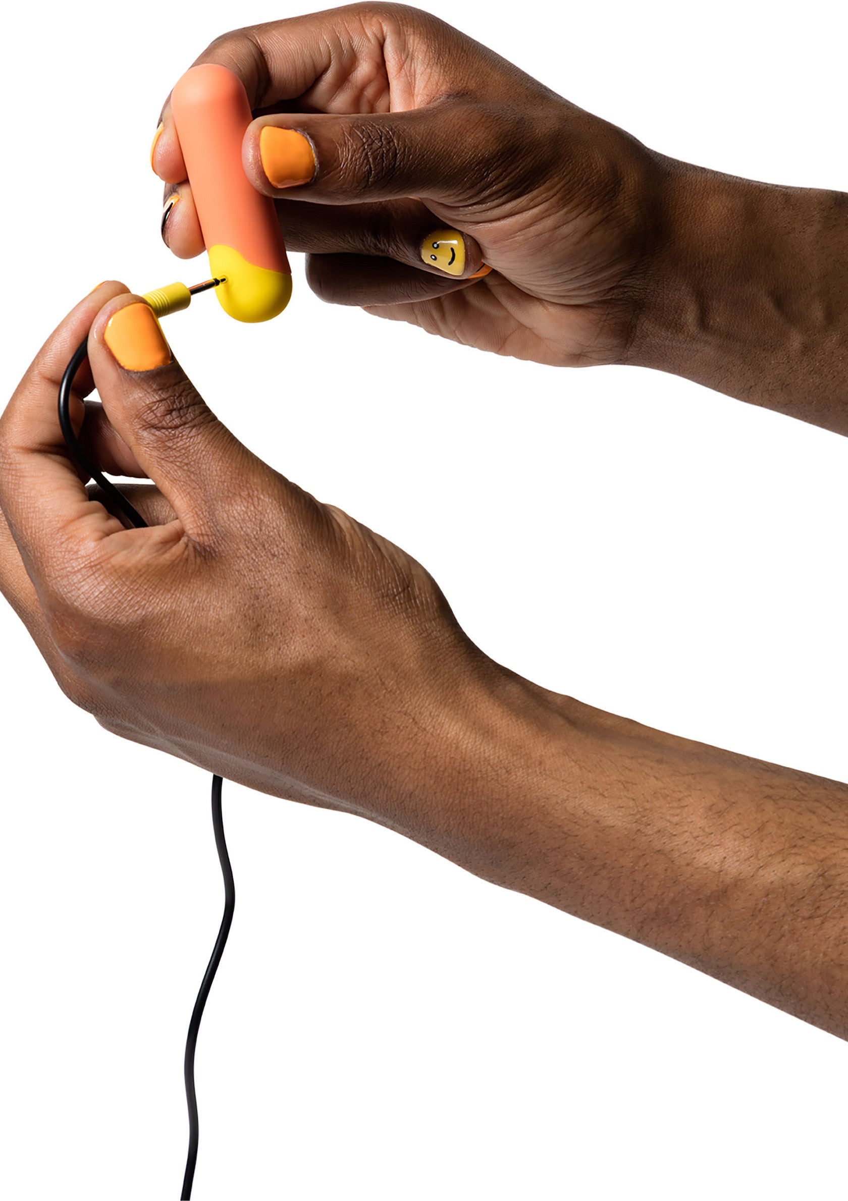 Oreillettes funky orange et jaune avec fil noir, parfaites pour un son cool et coloré.; Oranje en gele funky oordopjes met zwarte draad, perfect voor een cool en kleurrijk geluid.; Orange and yellow funky earbuds with black wire, perfect for a cool and colorful sound.